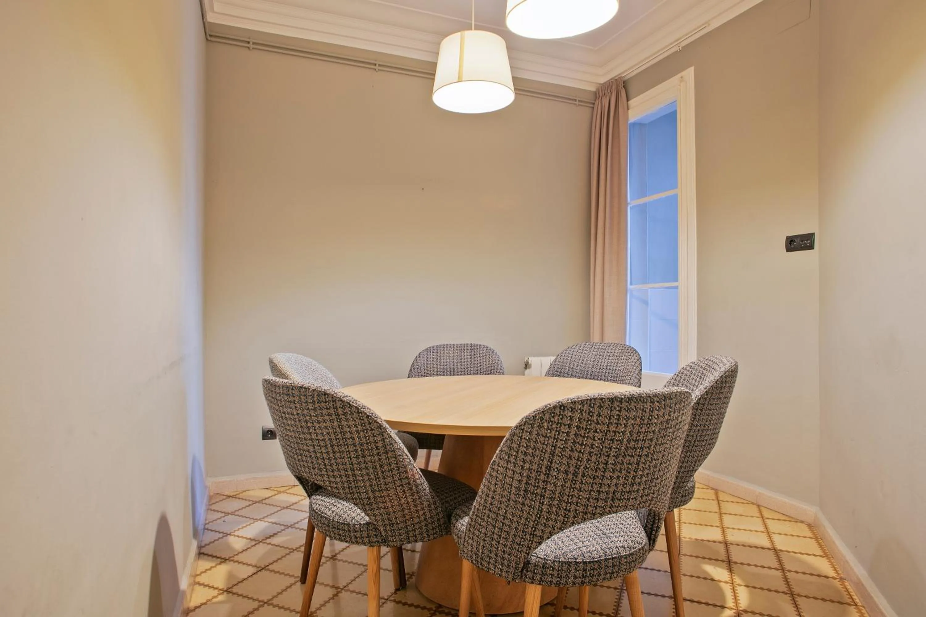Dining area in Numa I Caja Apartments