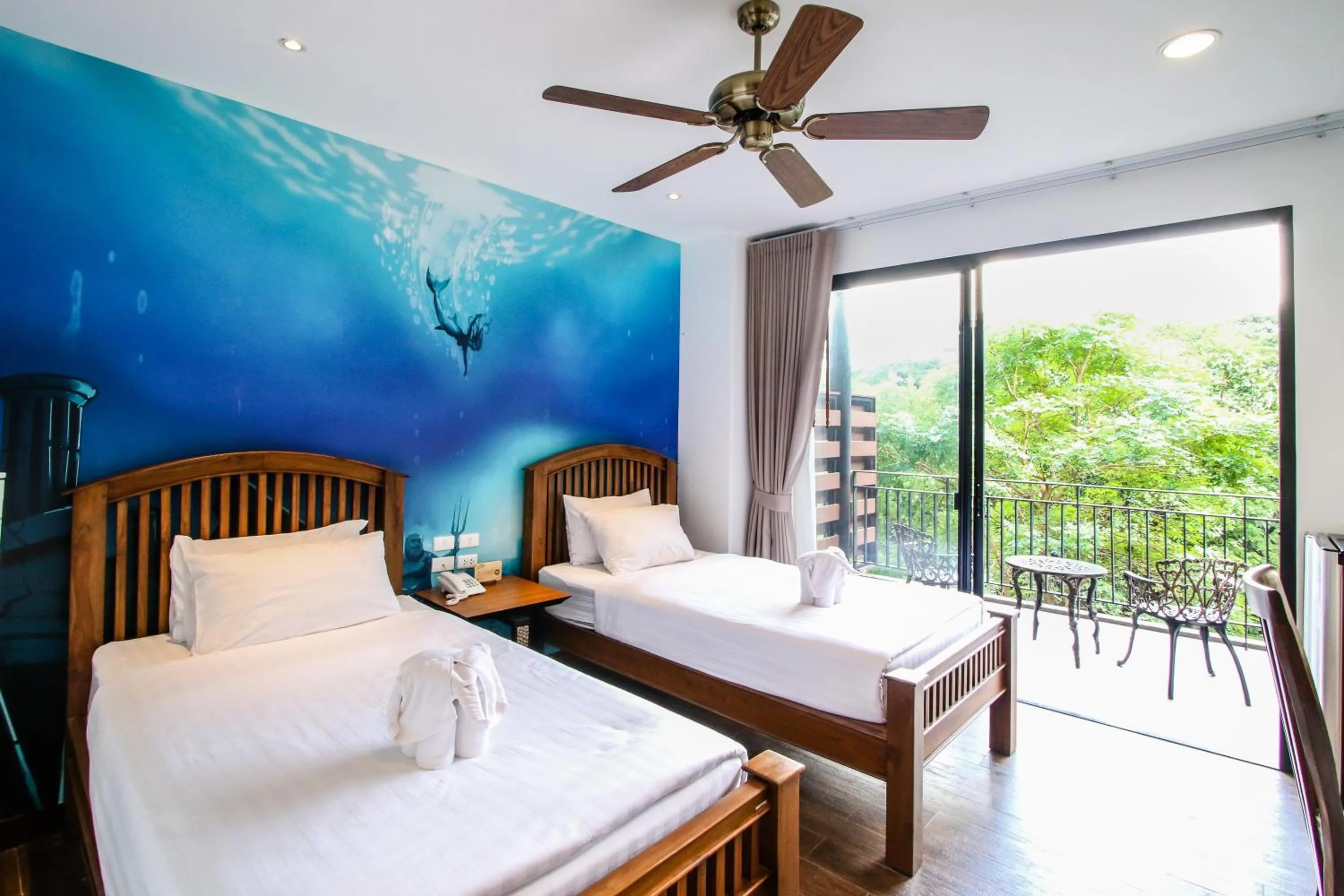 Bed in Rain Tree Khao Yai Hotel