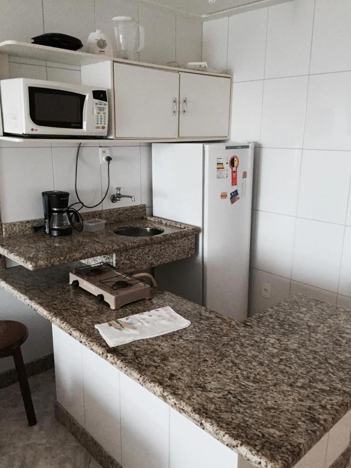 Kitchen or kitchenette in Flat Vista Mar Frente ou Lateral na Barra em Salvador