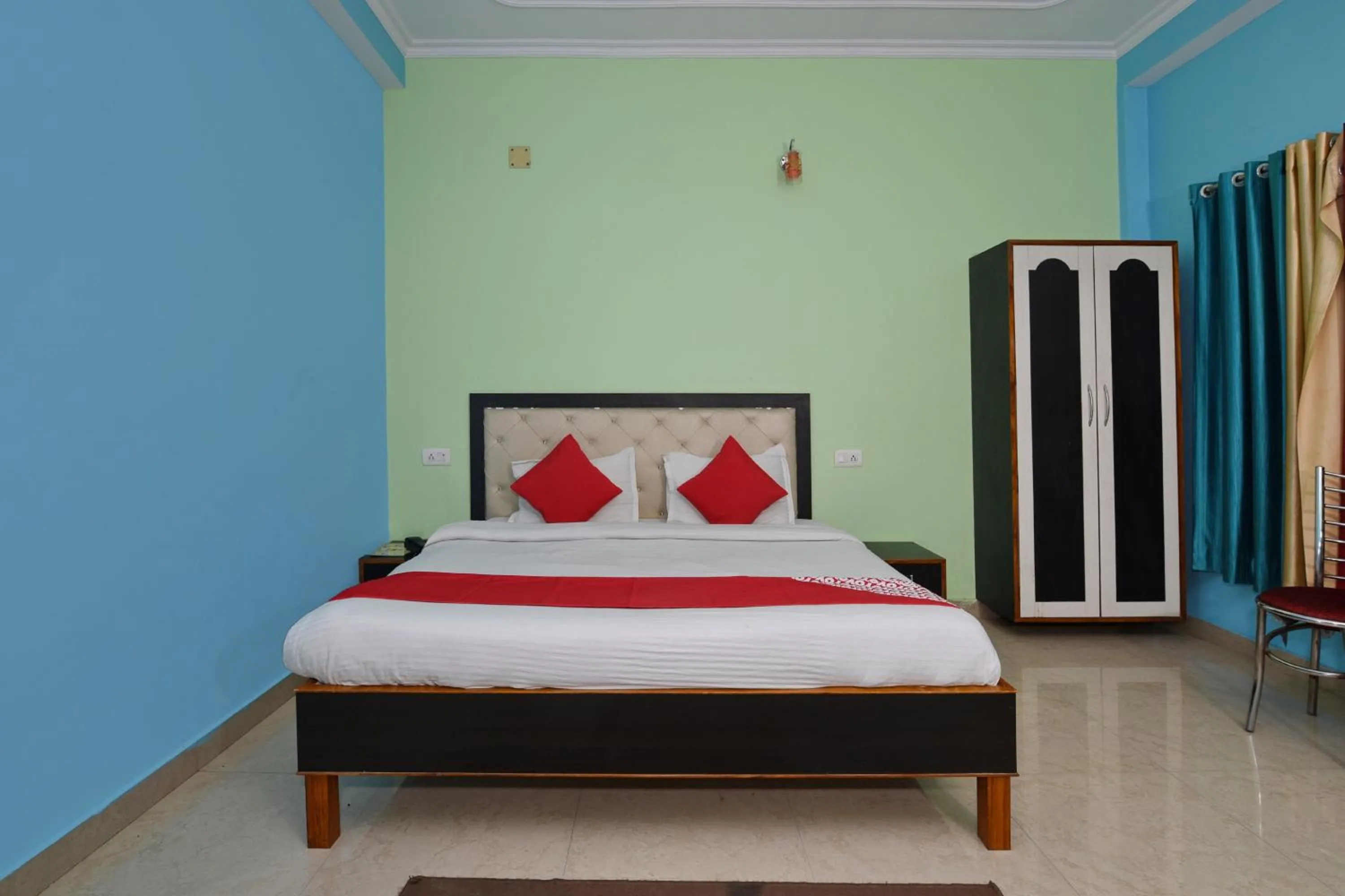 Bedroom, Bed in Hotel O Chaitanya Inn