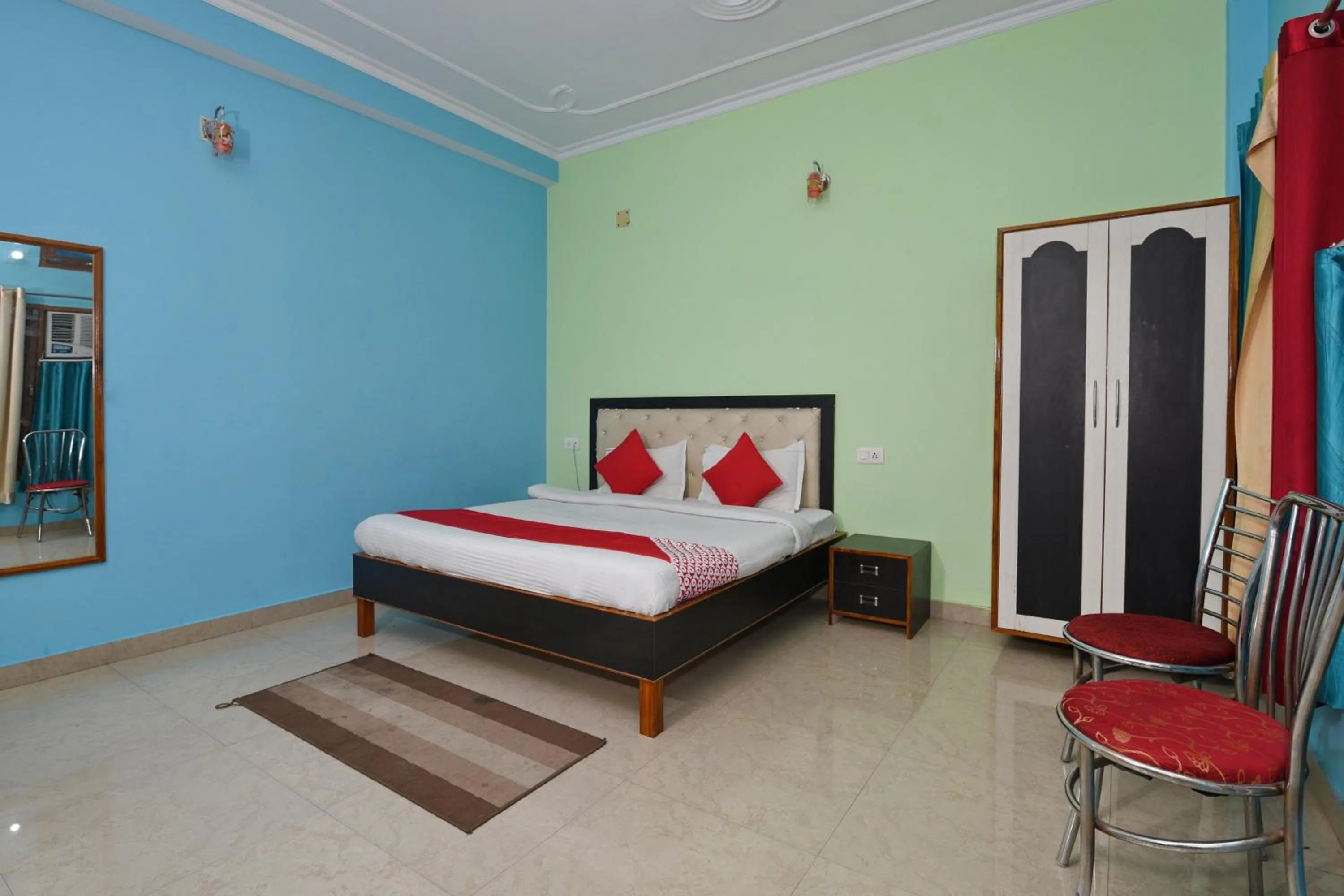 Bedroom, Bed in Hotel O Chaitanya Inn