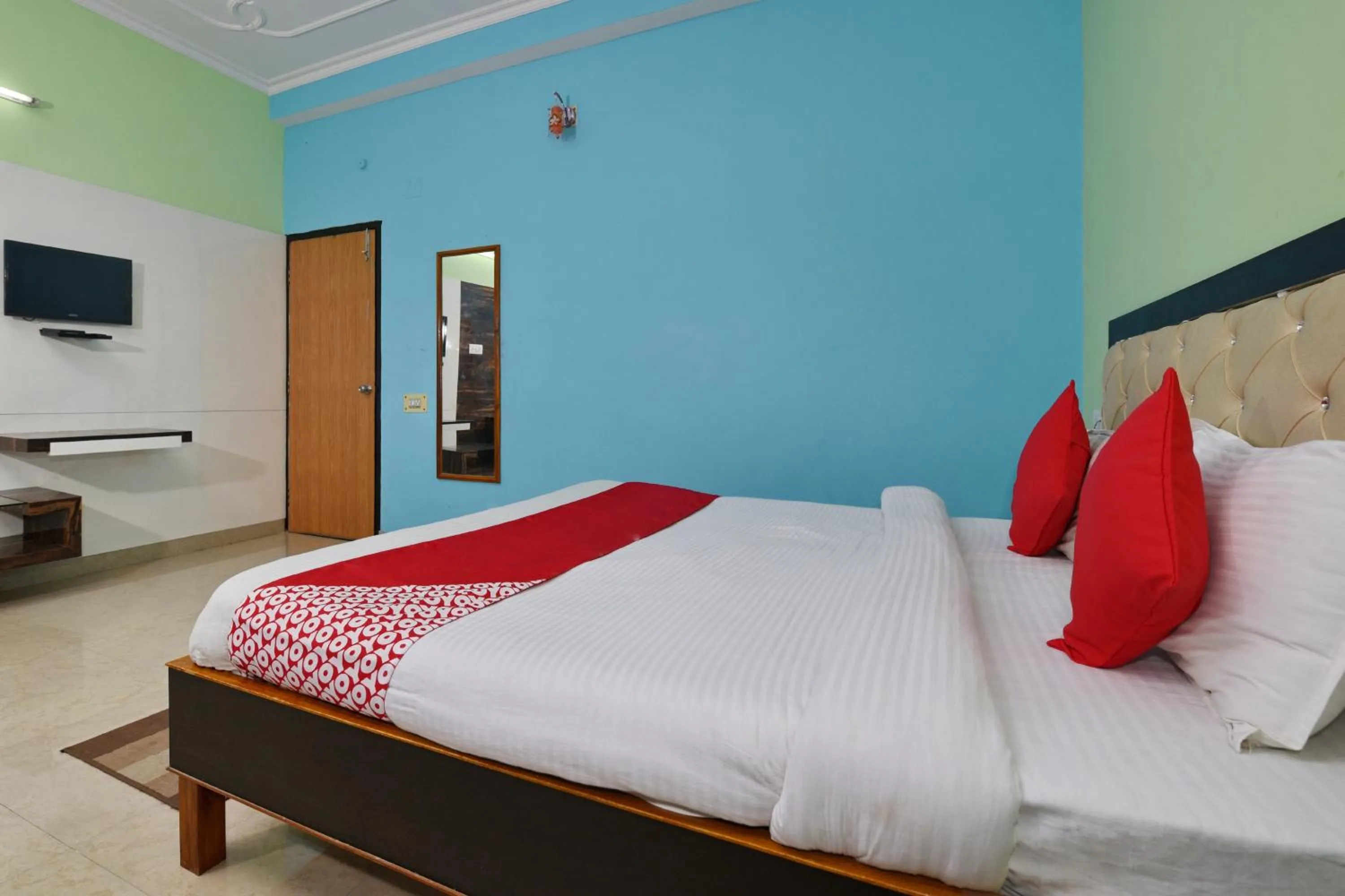 Bedroom, Bed in Hotel O Chaitanya Inn