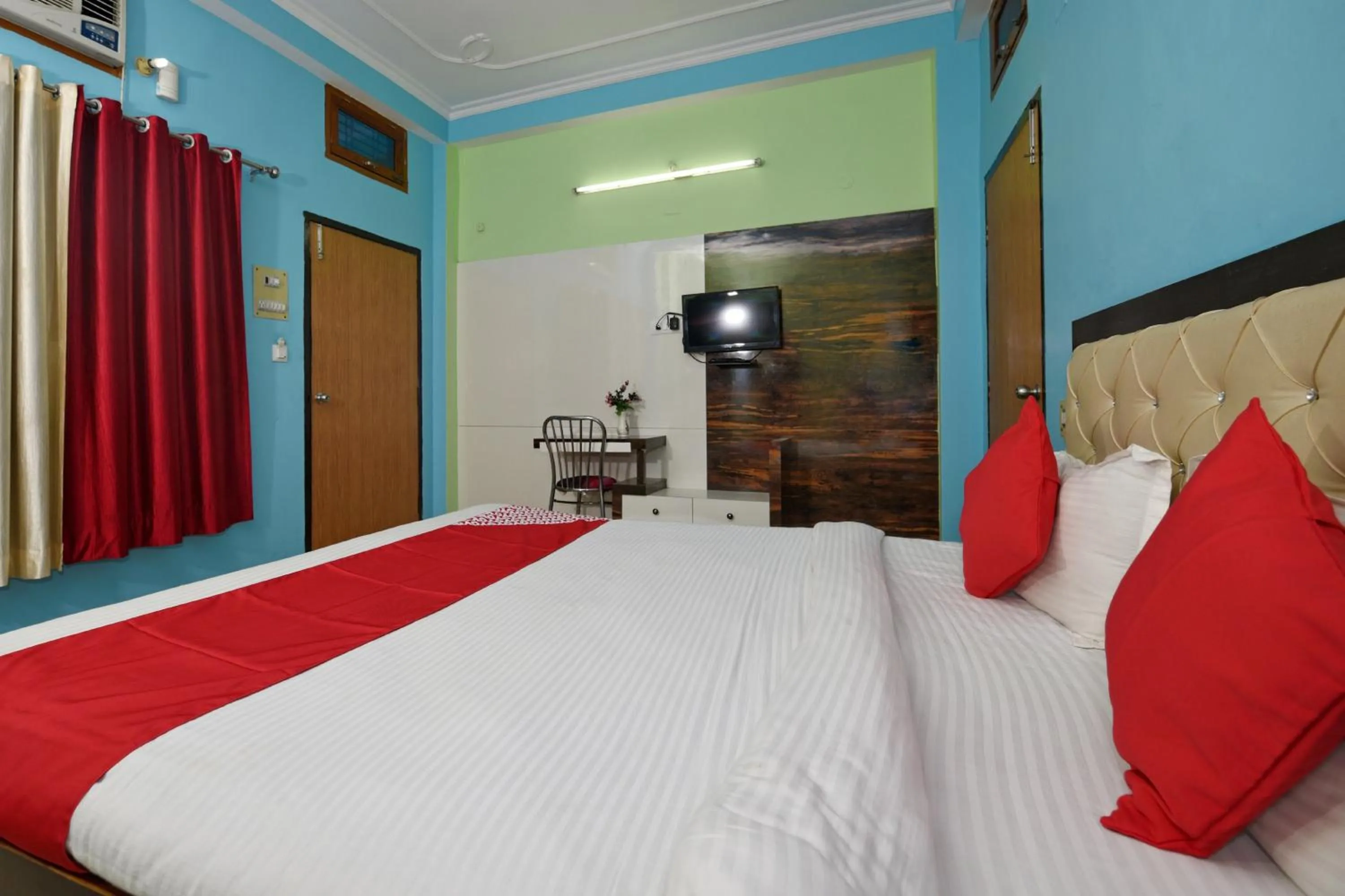 Bedroom, Bed in Hotel O Chaitanya Inn