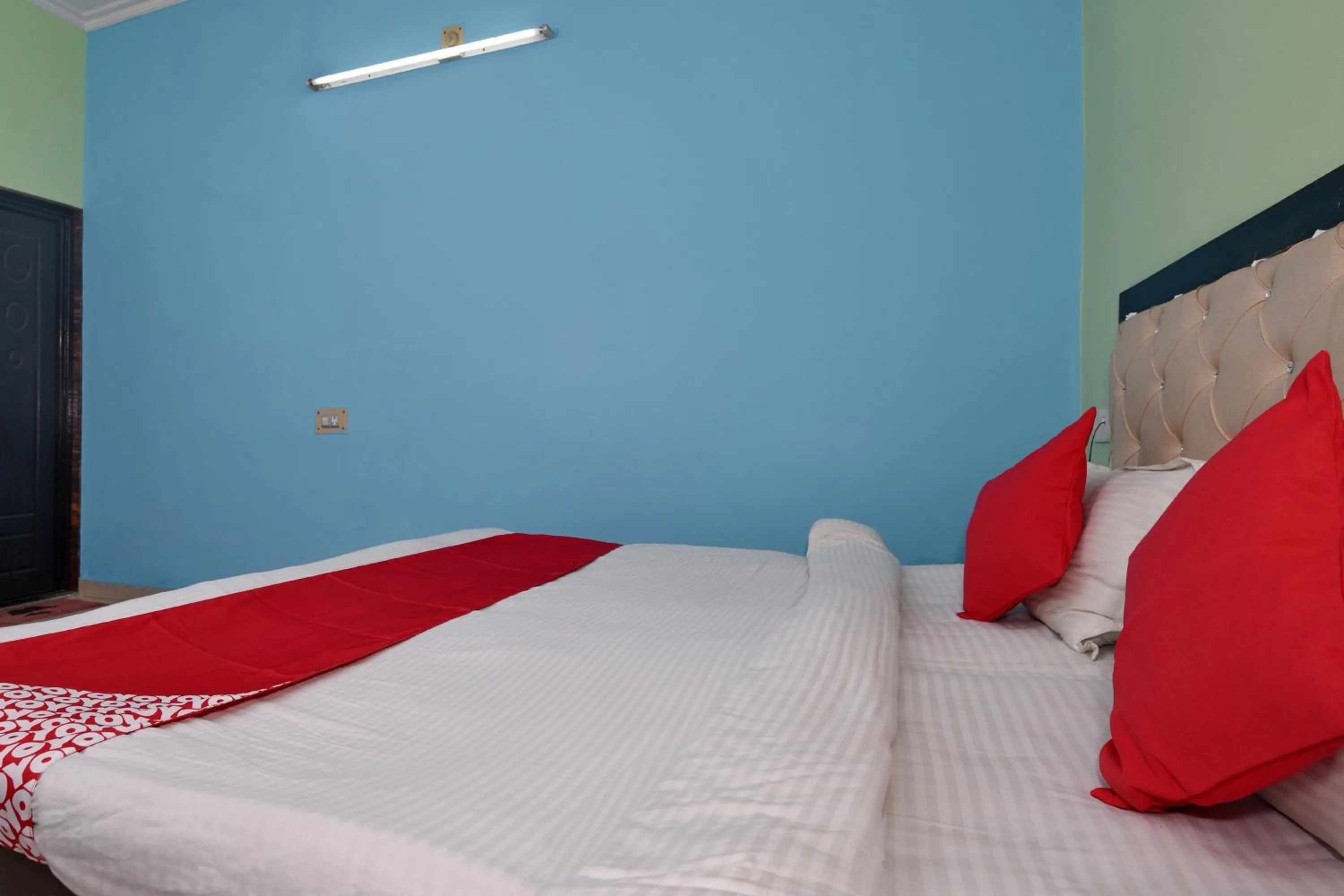 Bedroom, Bed in Hotel O Chaitanya Inn