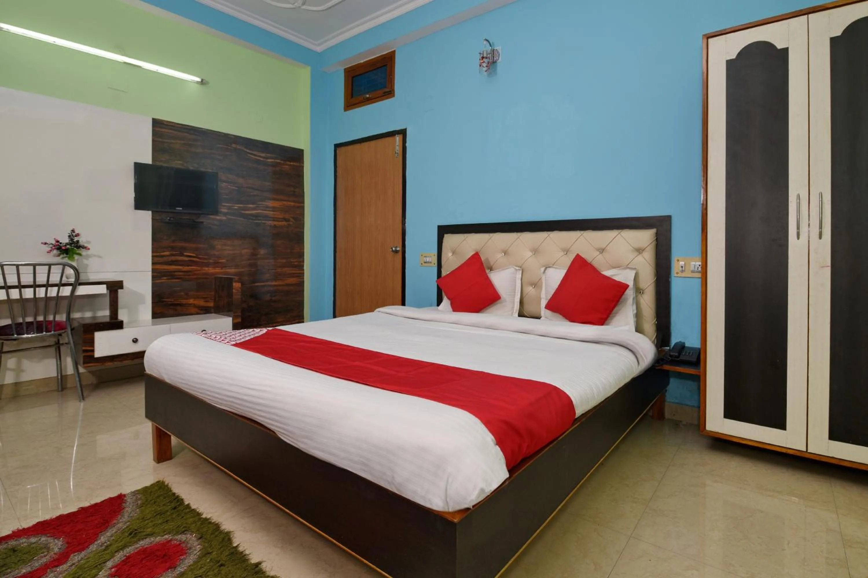 Bedroom, Bed in Hotel O Chaitanya Inn