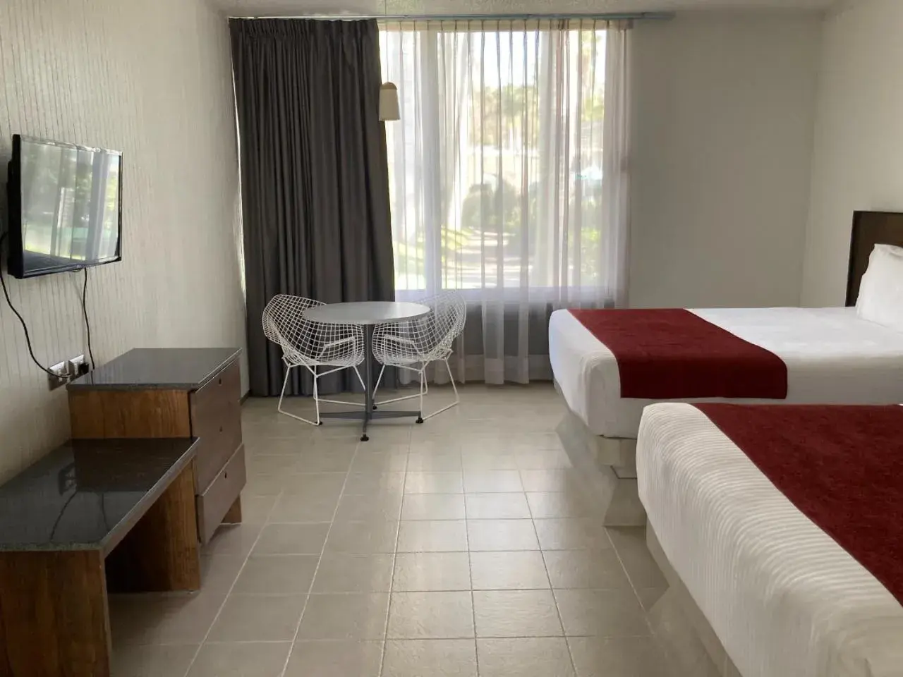 Classic Quadruple Room - single occupancy in Hotel Y Parque Acuático La Caldera Classic Quadruple Room - single occupancy in Hotel Y Parque Acuático La Caldera