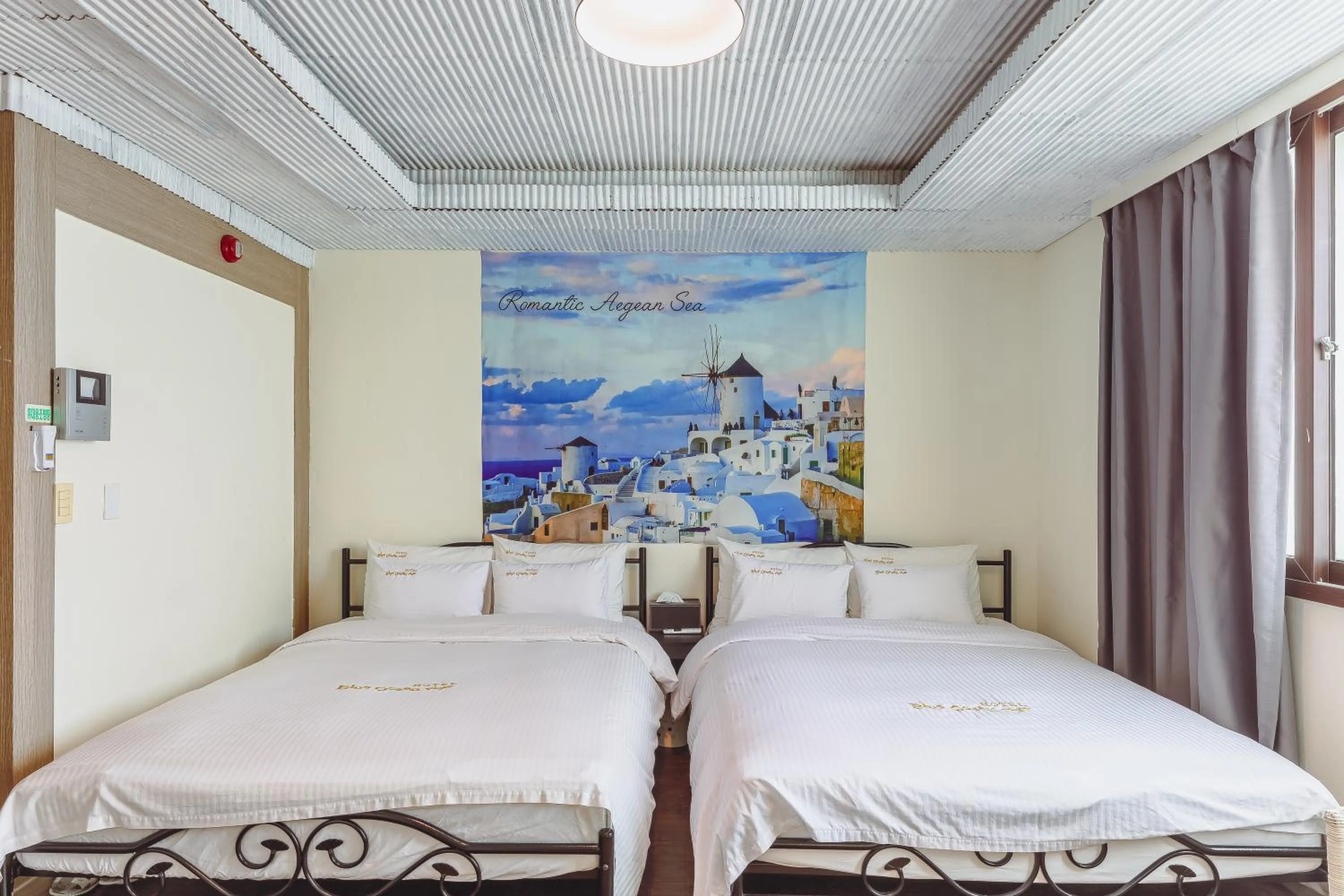 Bed in Residence Hotel Blue Ocean View