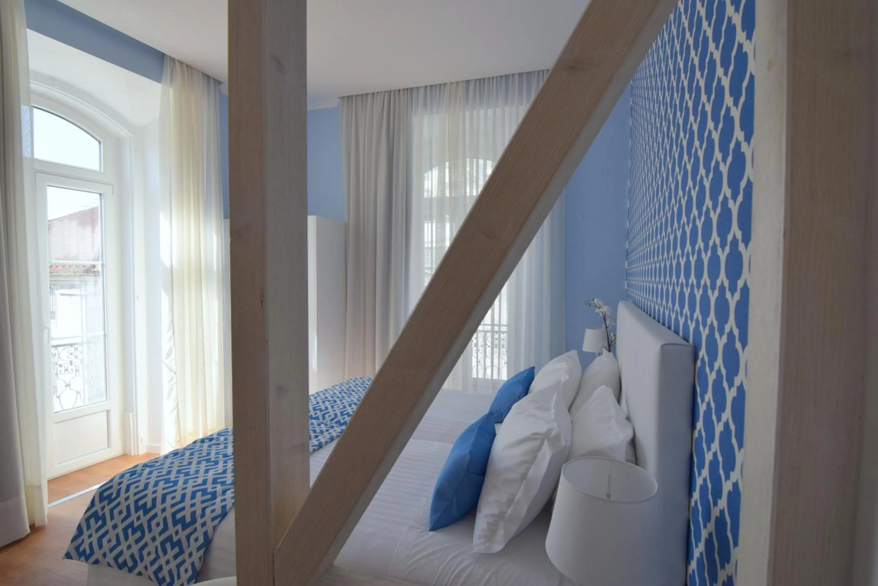 Decorative detail, Bed in Dream Chiado Apartments