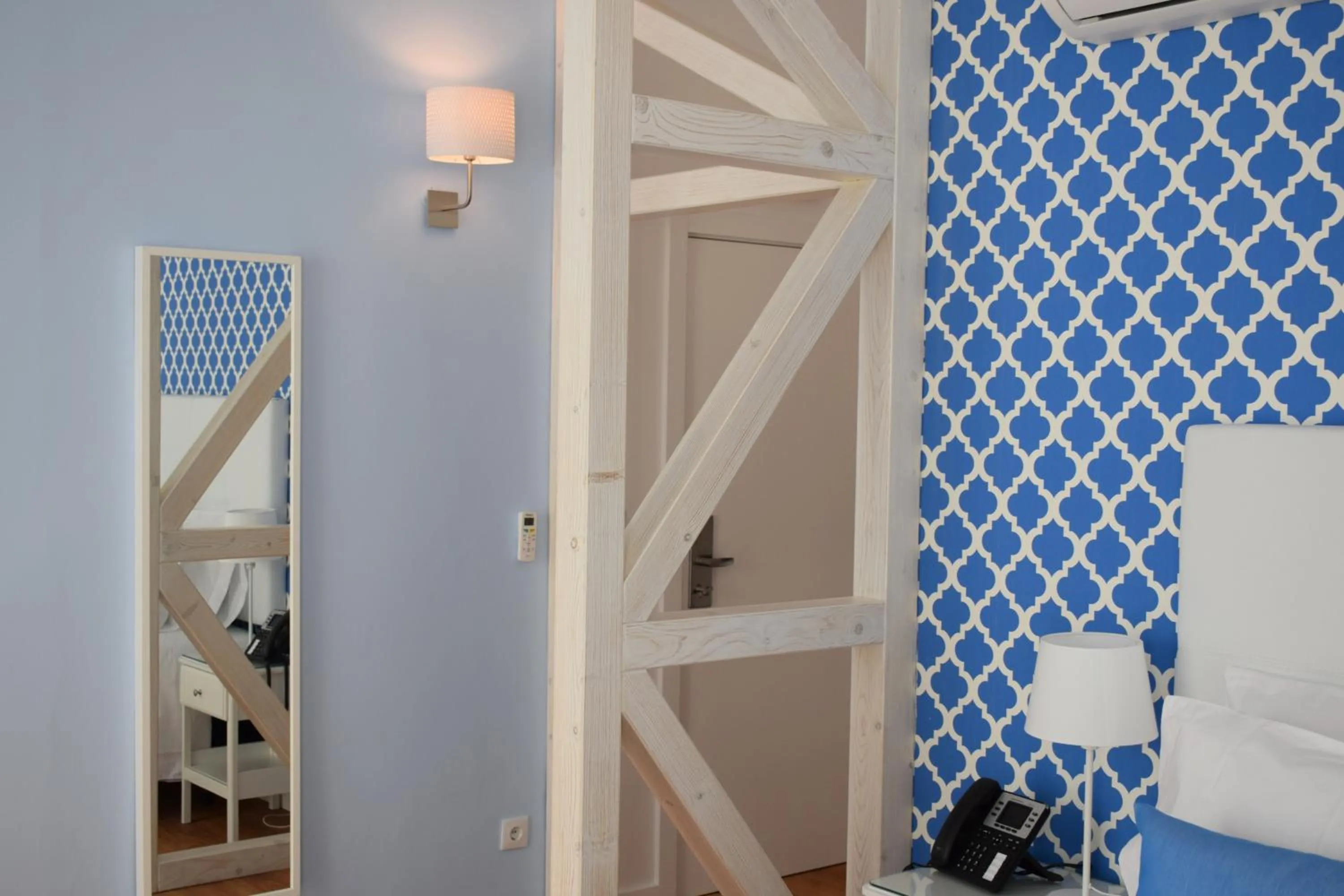 Decorative detail, Bed in Dream Chiado Apartments