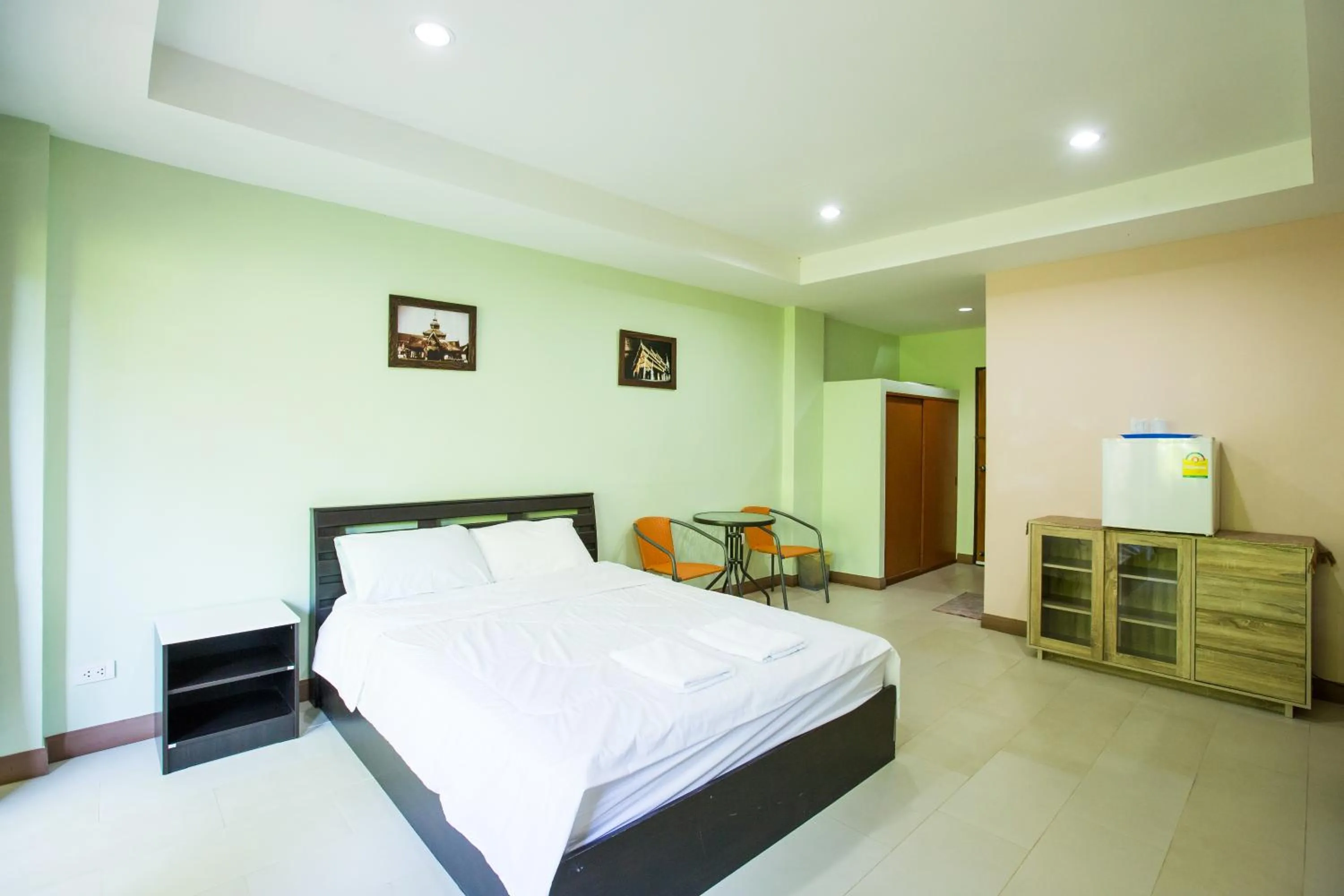 Photo of the whole room, Bed in Banlanna Hotel Lampang