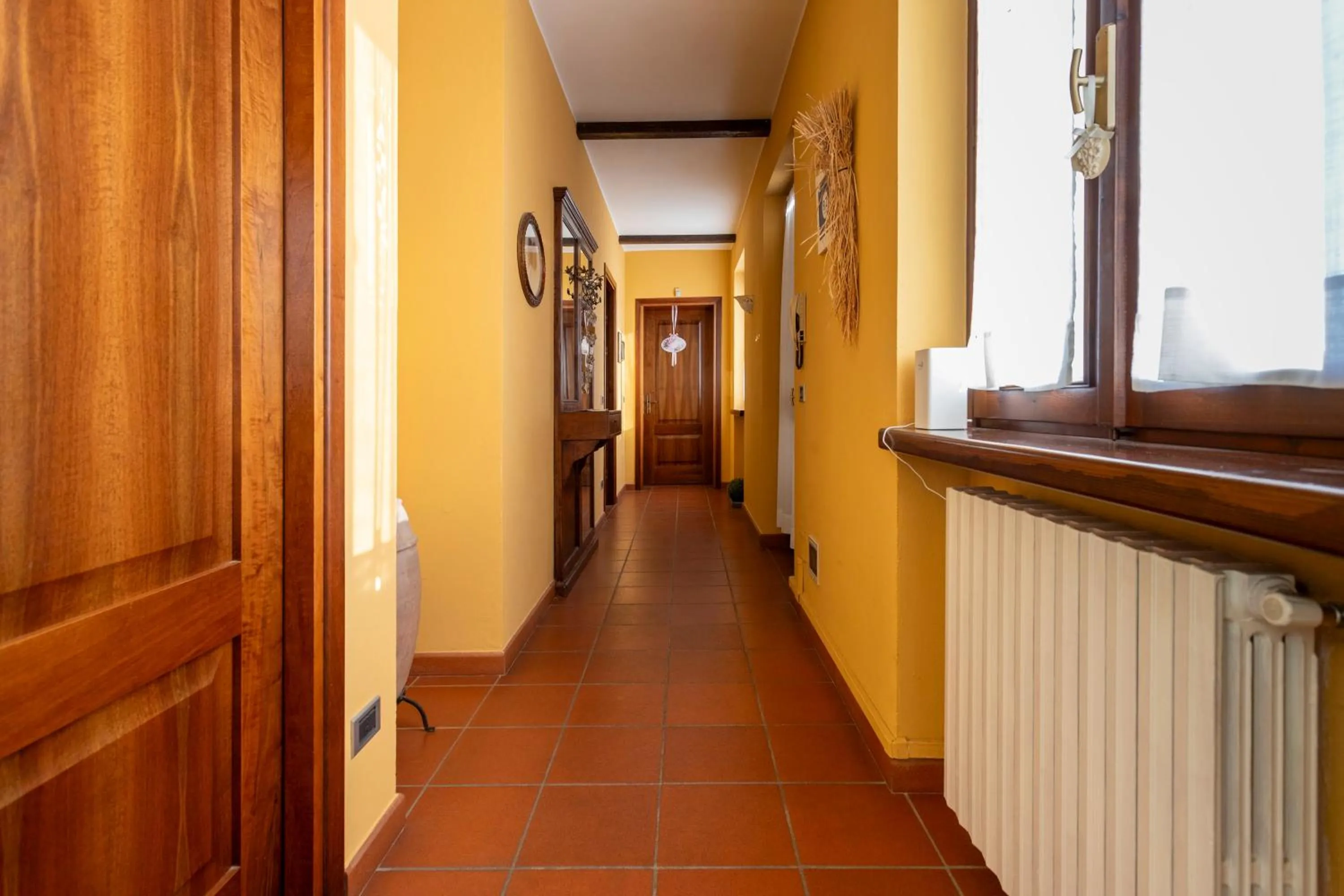 Communal lounge/ TV room in B&B Cascina Baraggione