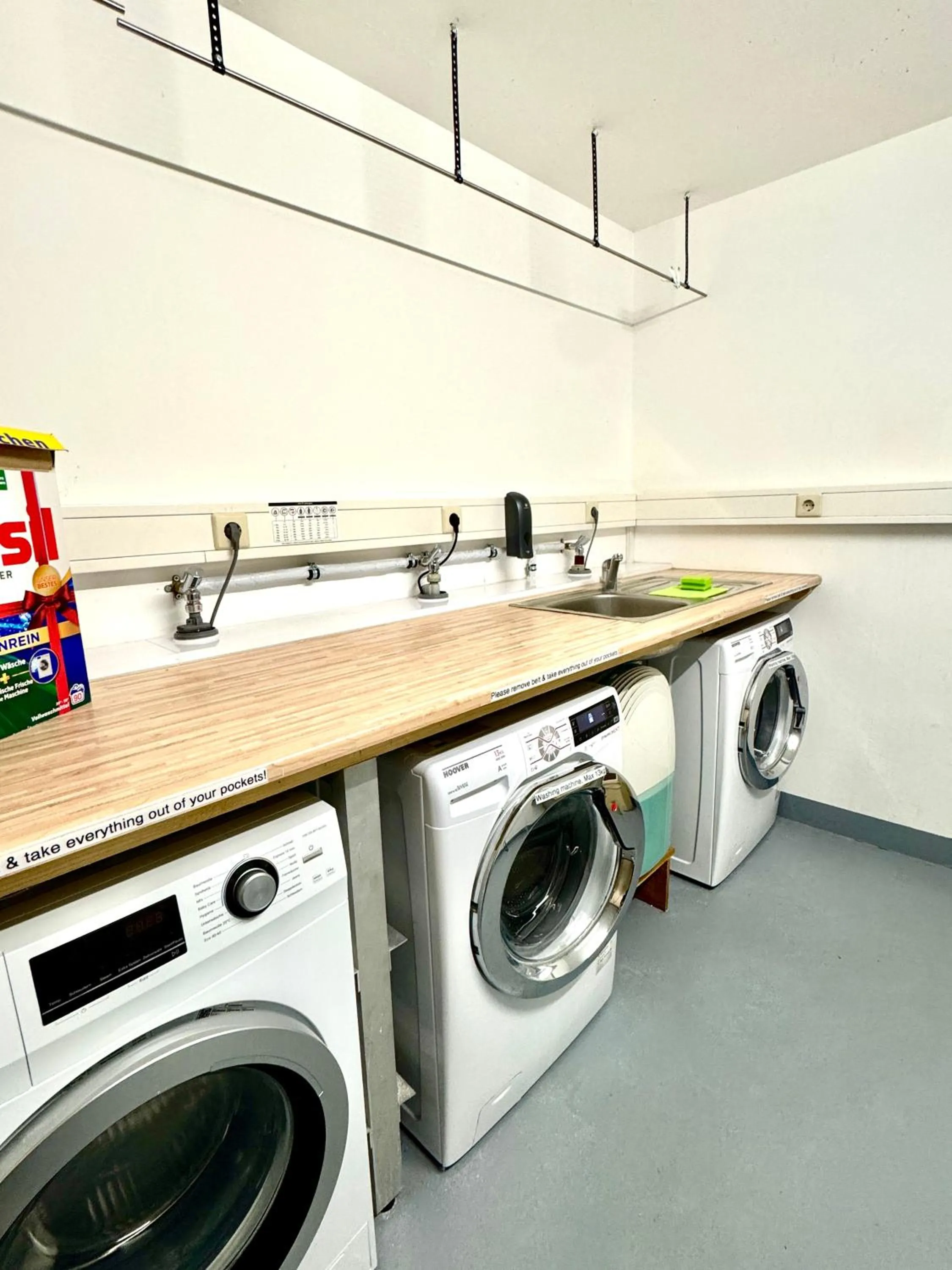 washing machine in Aparthotel Pumpengasse