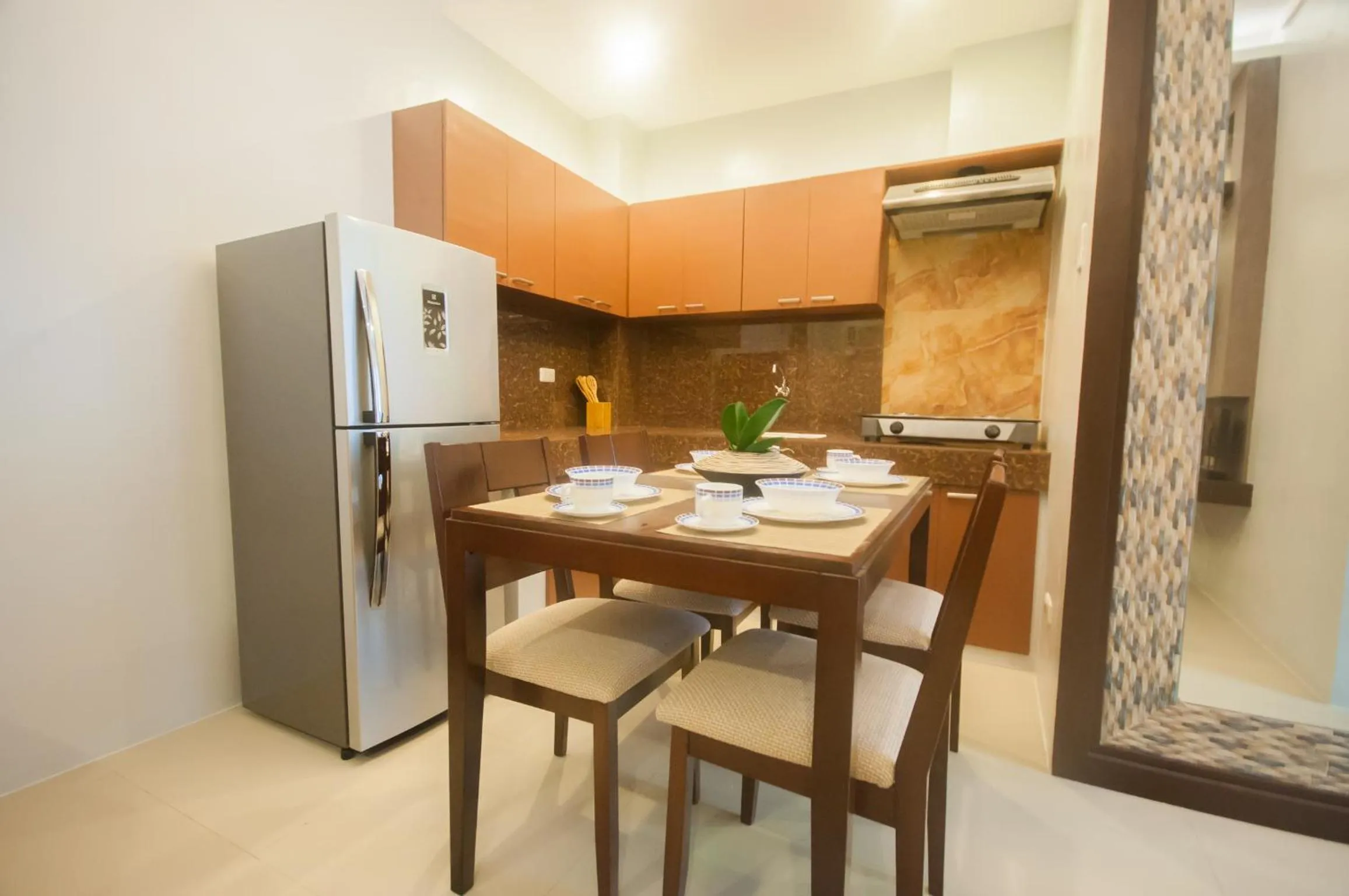 Kitchen or kitchenette in NF Suites