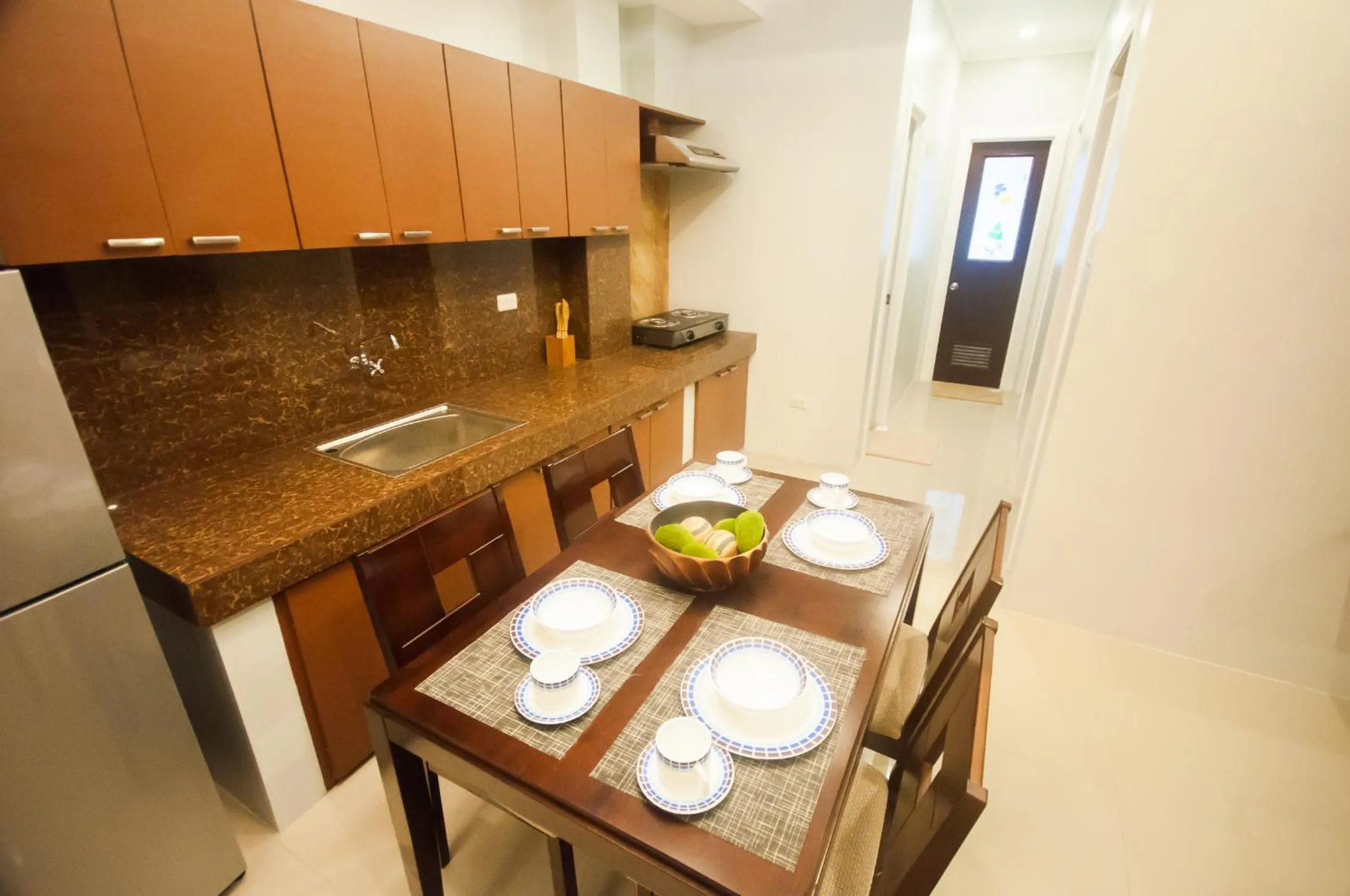 Kitchen or kitchenette in NF Suites