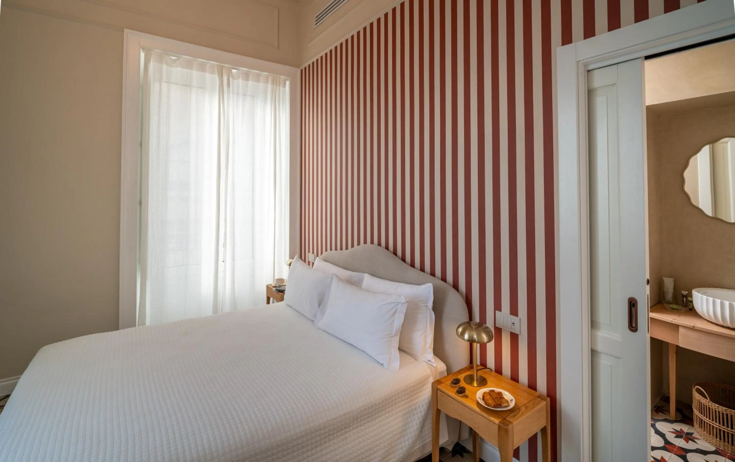 Bed in Villa Mabel Boutique Hotel