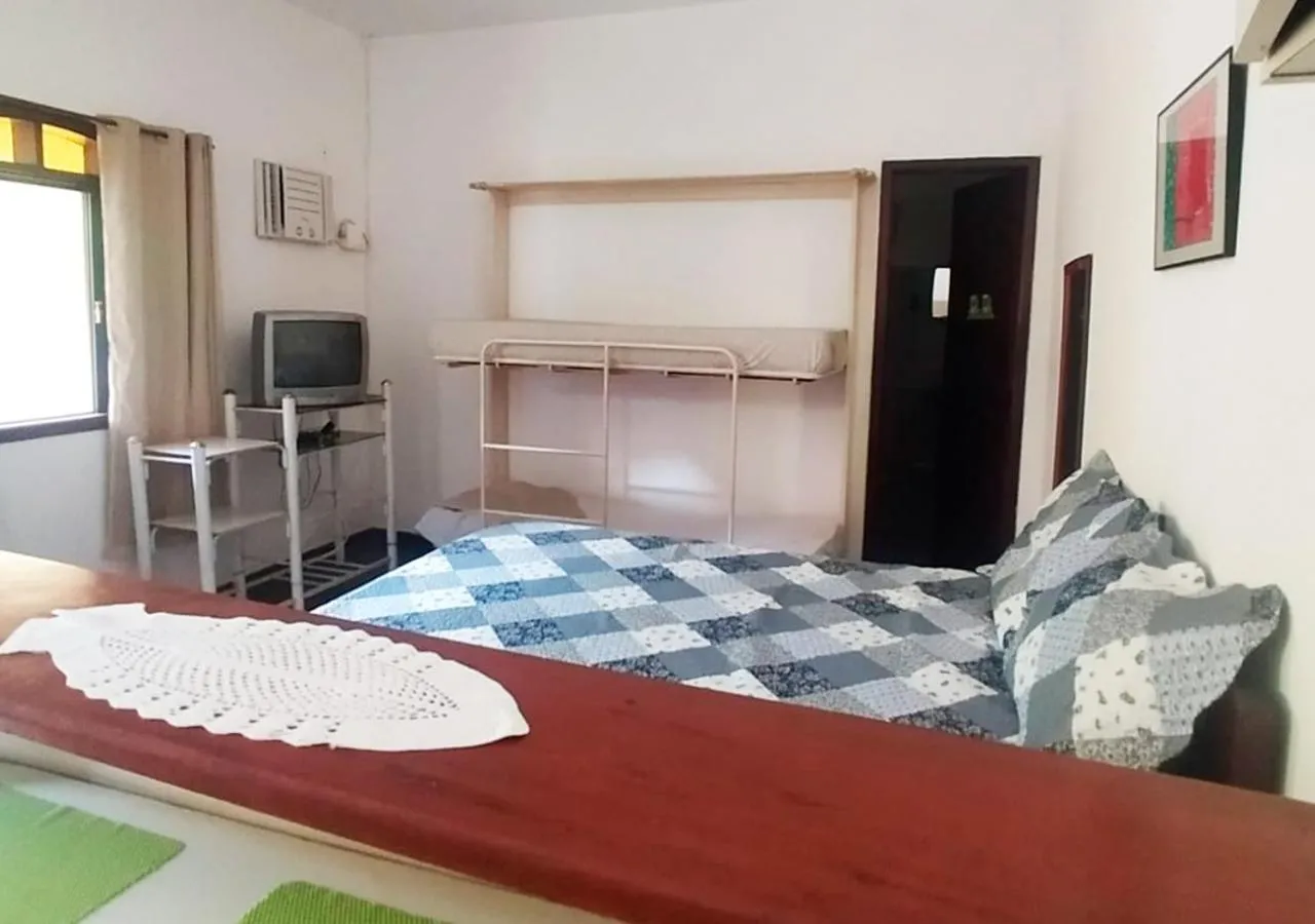 Communal lounge/ TV room, Bed in Suítes Jaconé - Saquarema