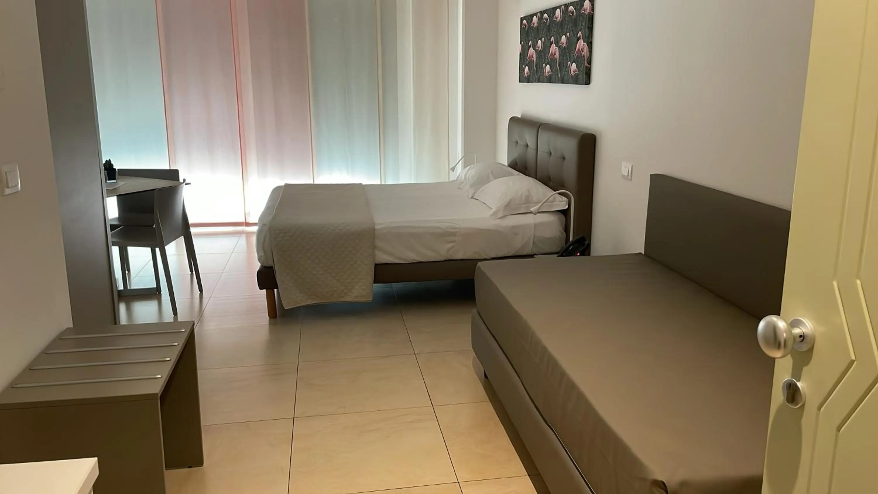 Bed in Zeus Hotel - Aparthotel - Meeting & Congress