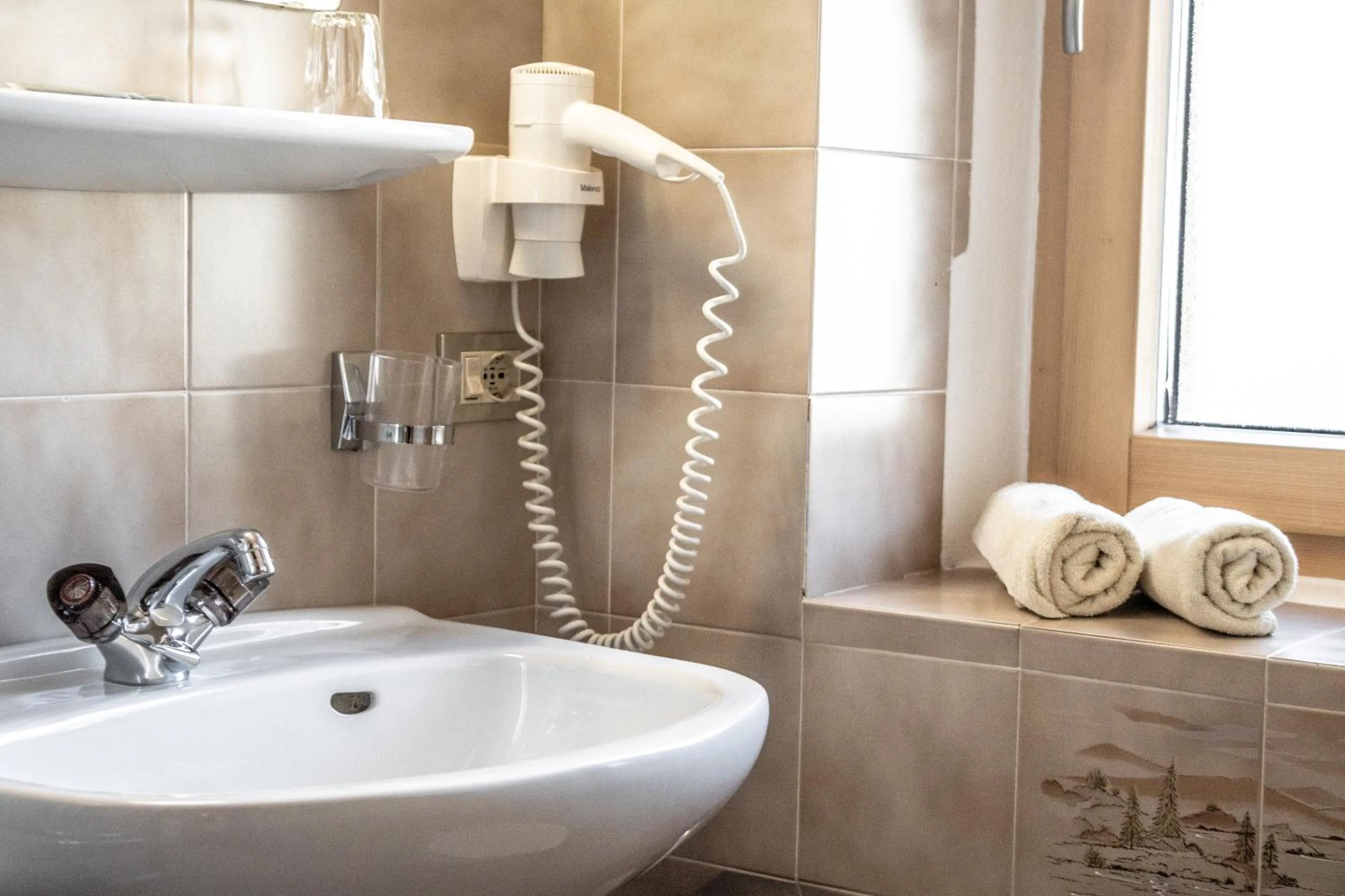 Bathroom in Garni Baita