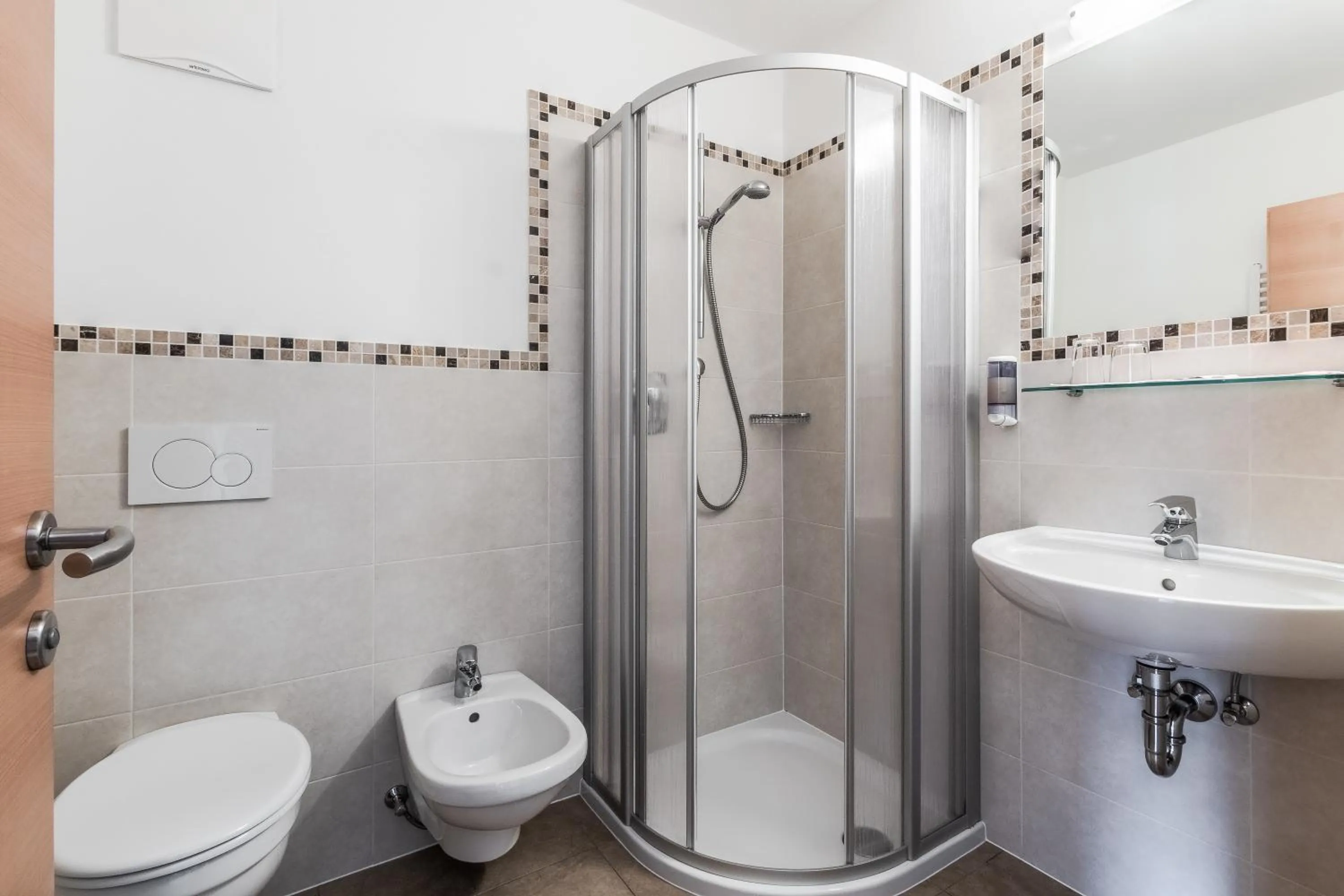 Bathroom in Garni Baita