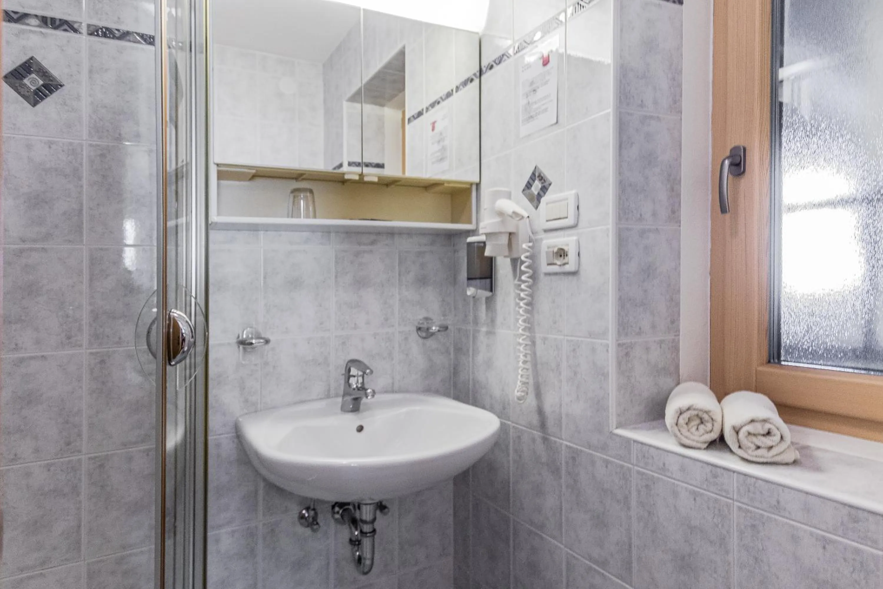 Bathroom in Garni Baita