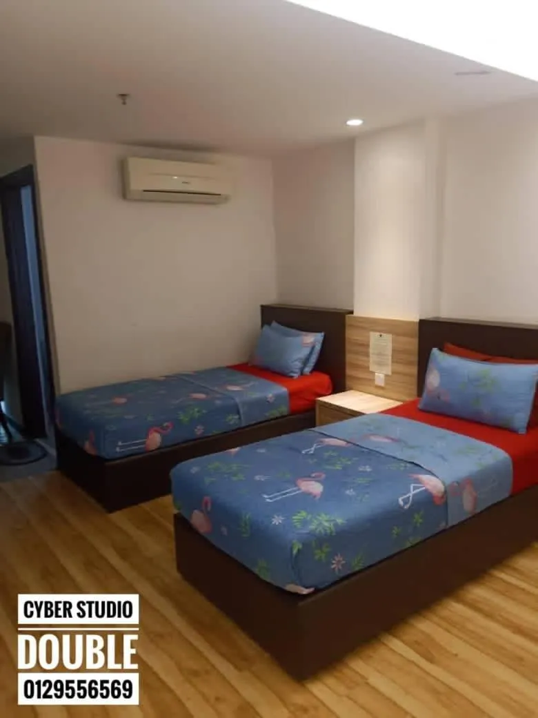 Bed in Cyber Studio Apartment