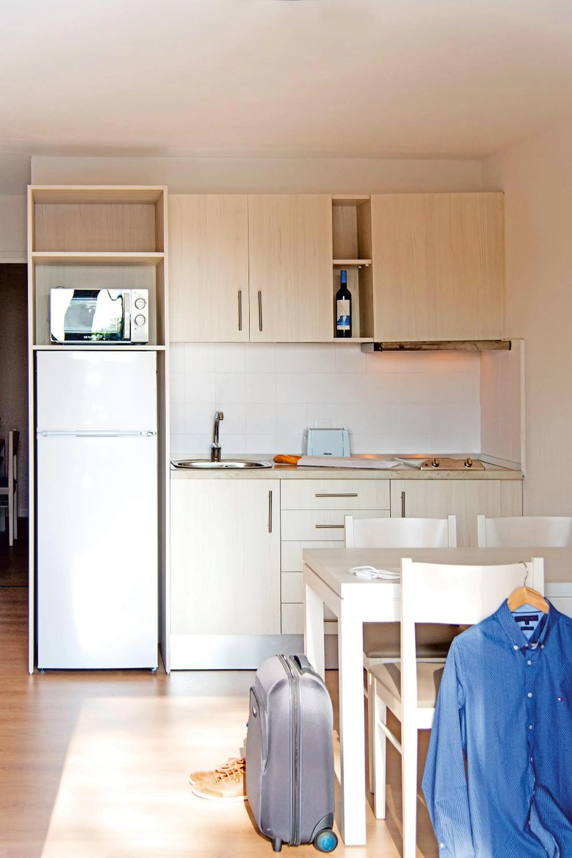 Kitchen or kitchenette in Apartamentos Cala Blanca