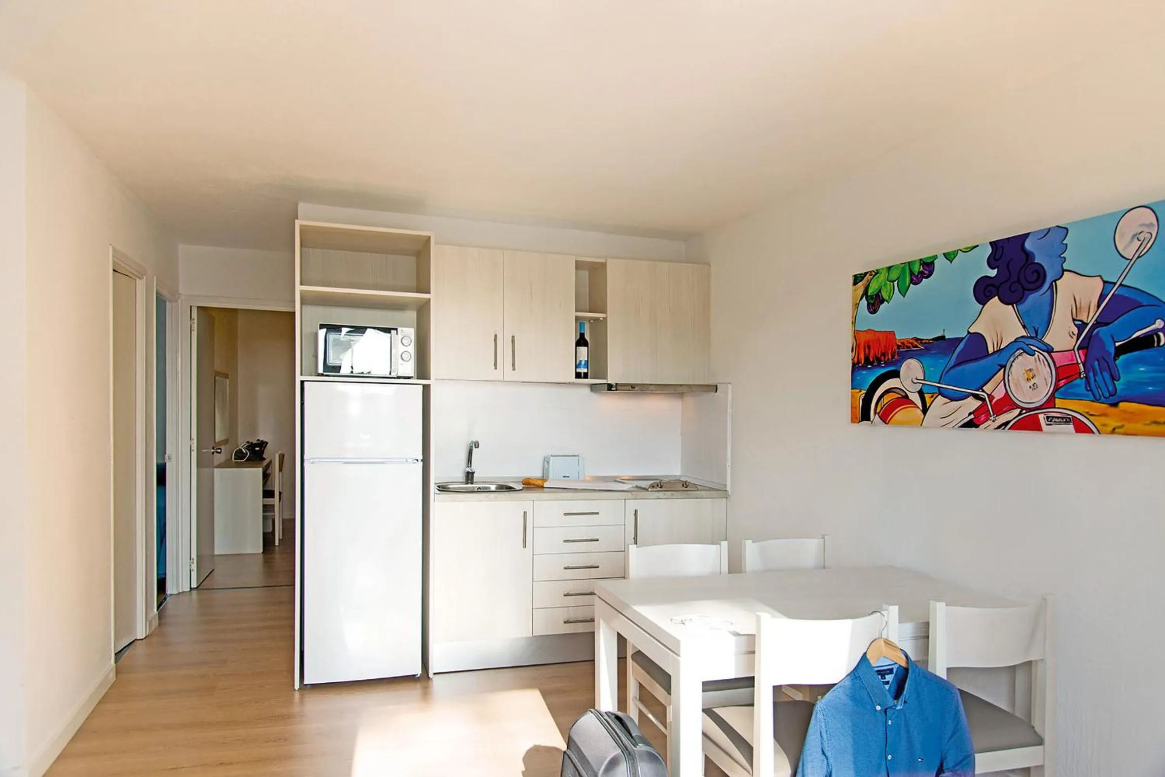 Kitchen or kitchenette in Apartamentos Cala Blanca