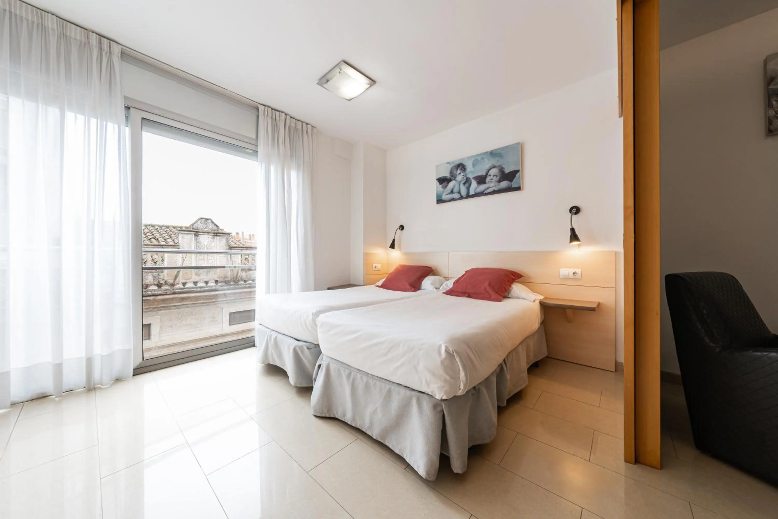 Bed in Neptuno Apartments