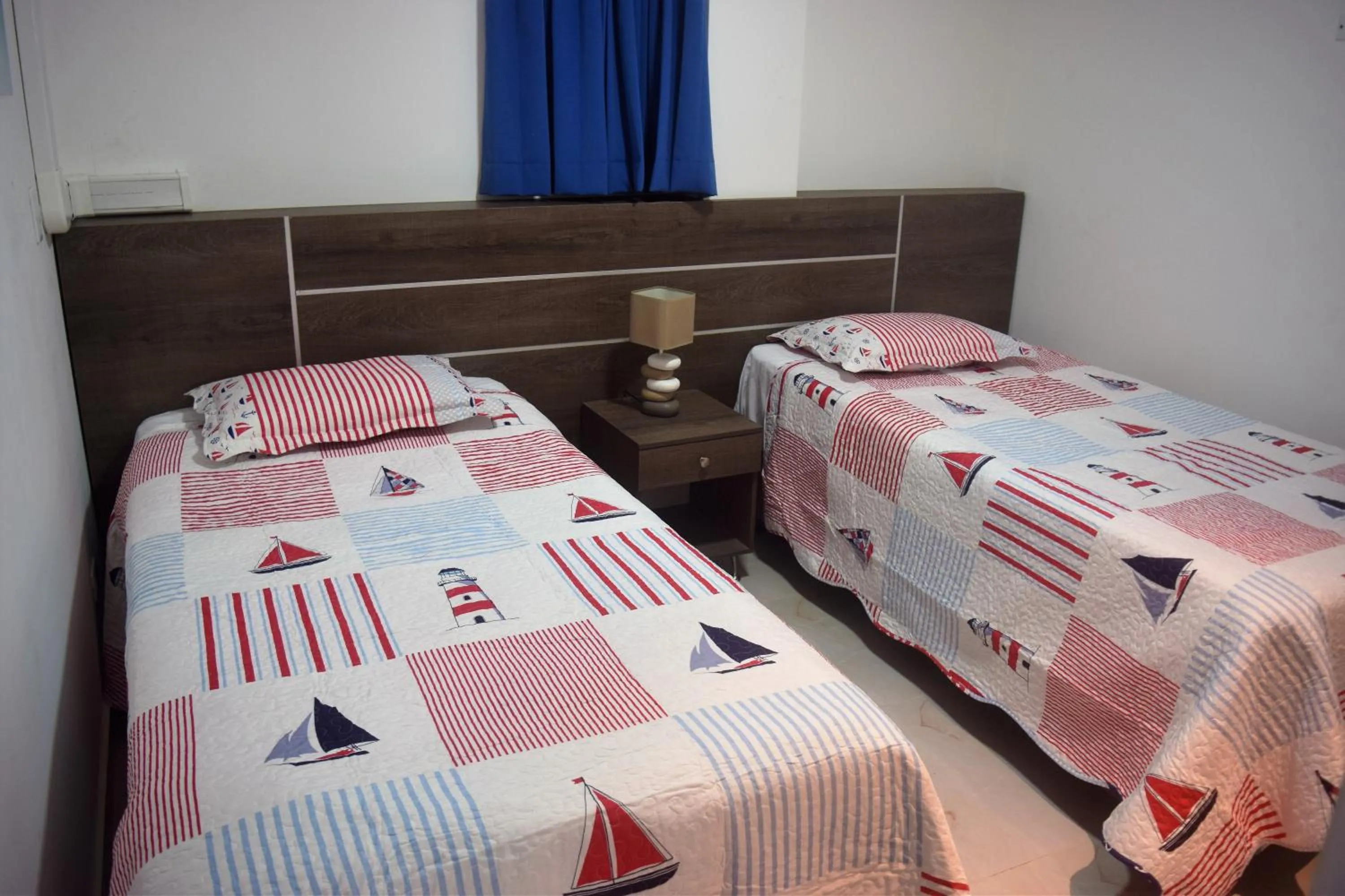 Bed in Sea Colors Apartments