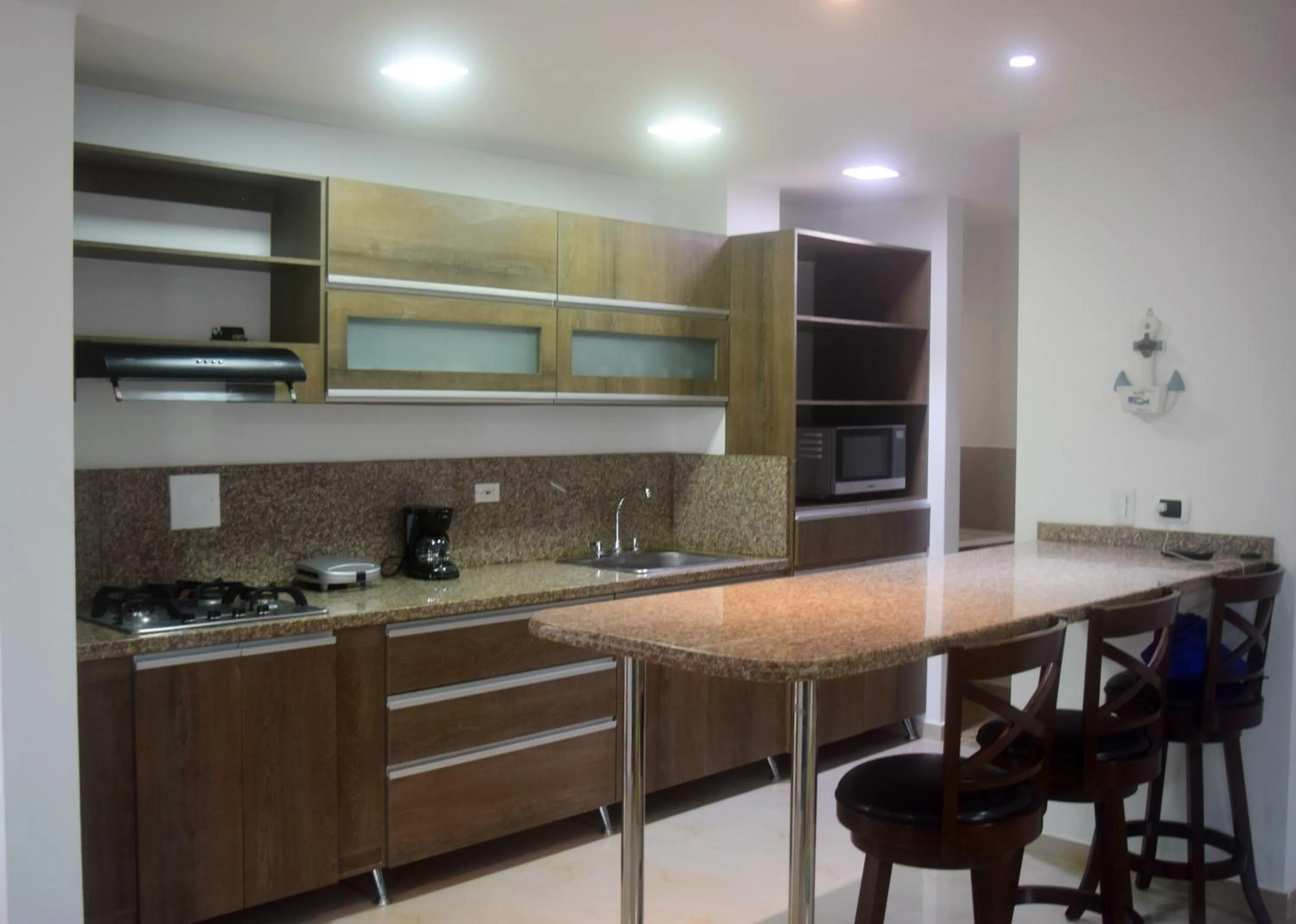 Kitchen or kitchenette in Sea Colors Apartments
