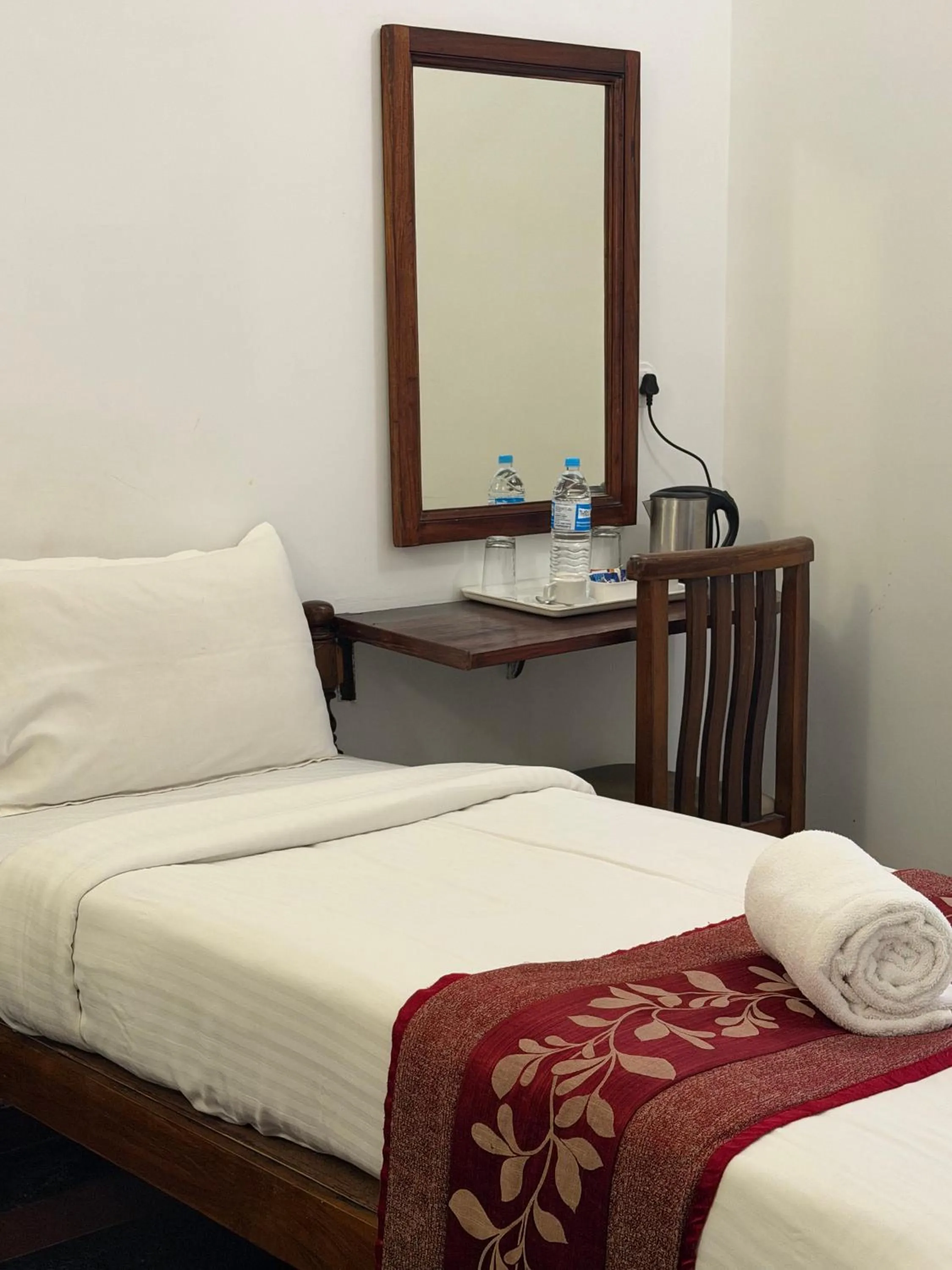 Bed in Hotel Bon Sejour