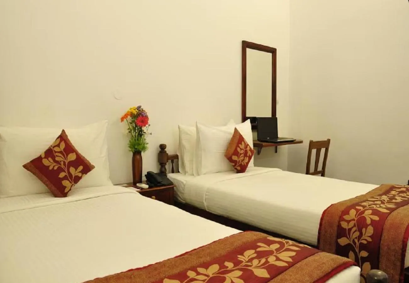 Bed in Hotel Bon Sejour