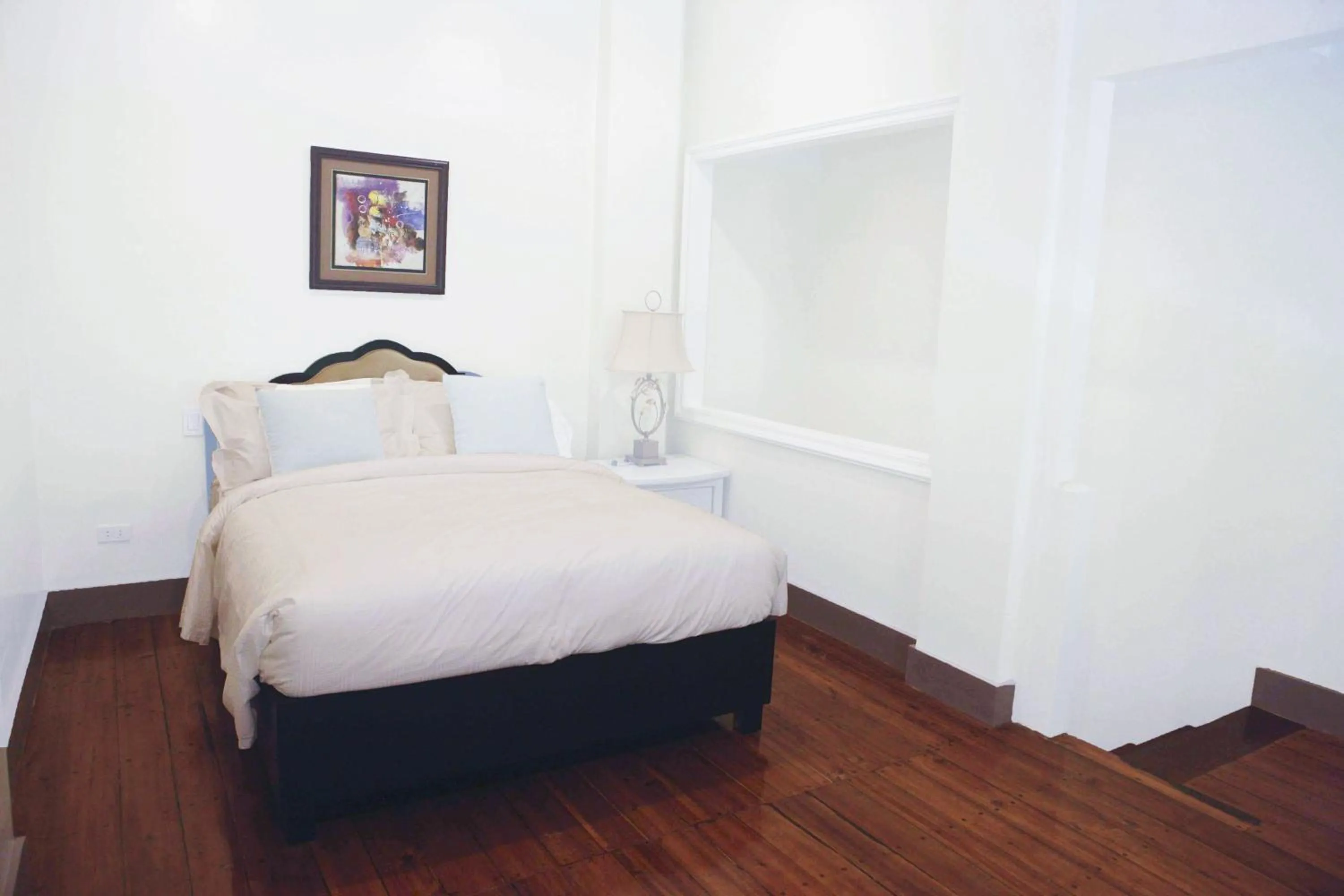 Bed in Matinloc Island Resort