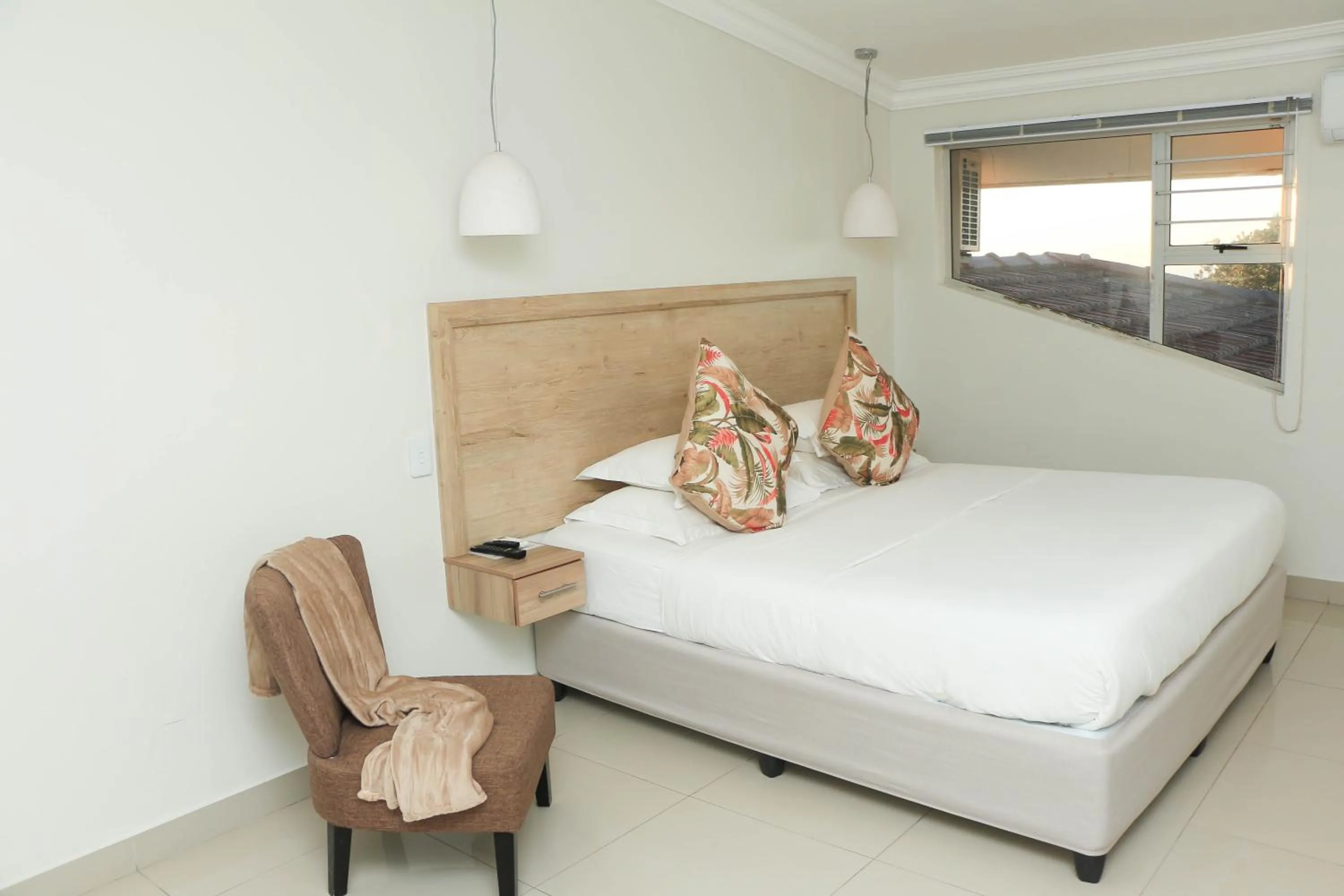 Bed in The Milkwood Beach Apartments