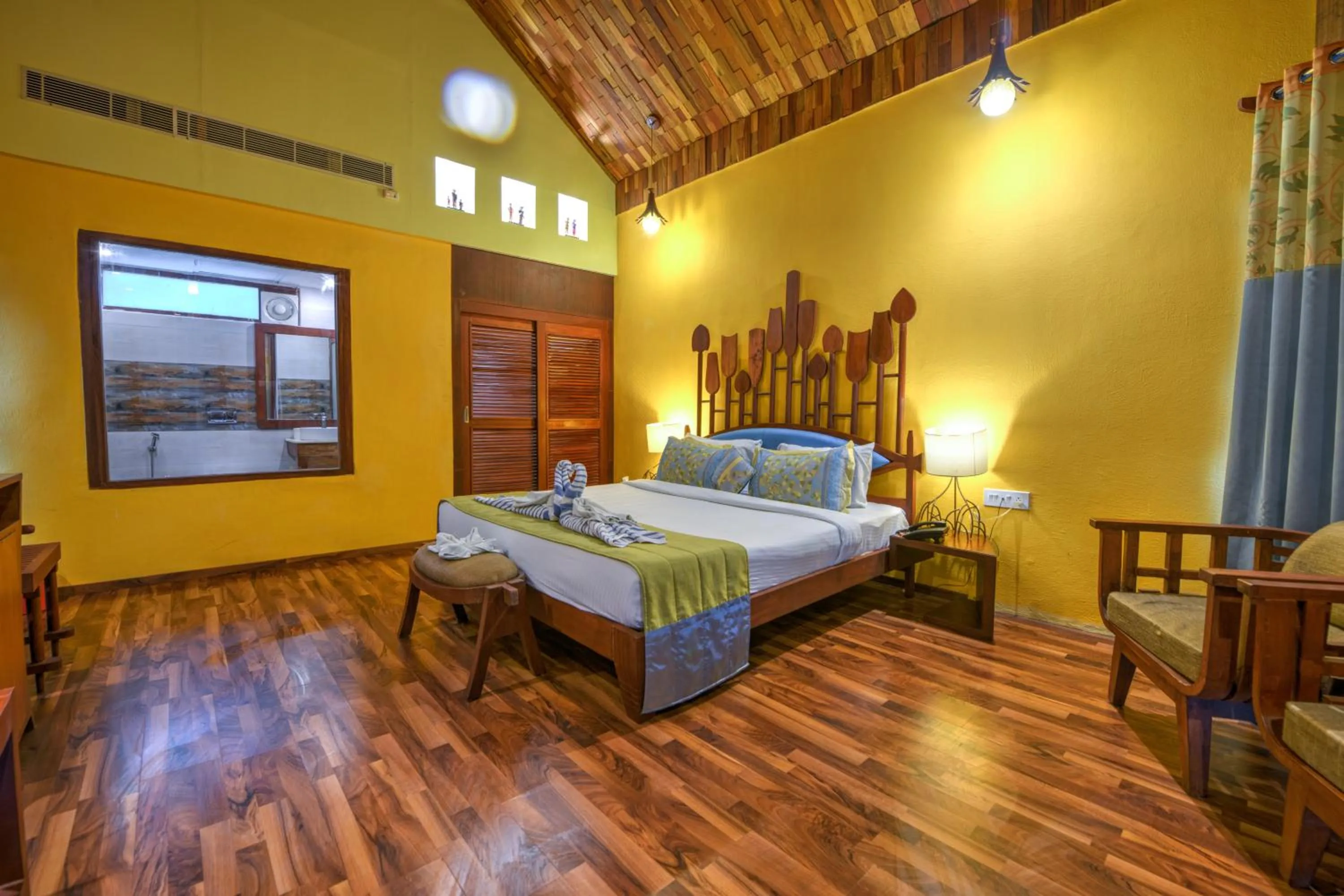 Bed in Silver Sand Beach Resort Neil