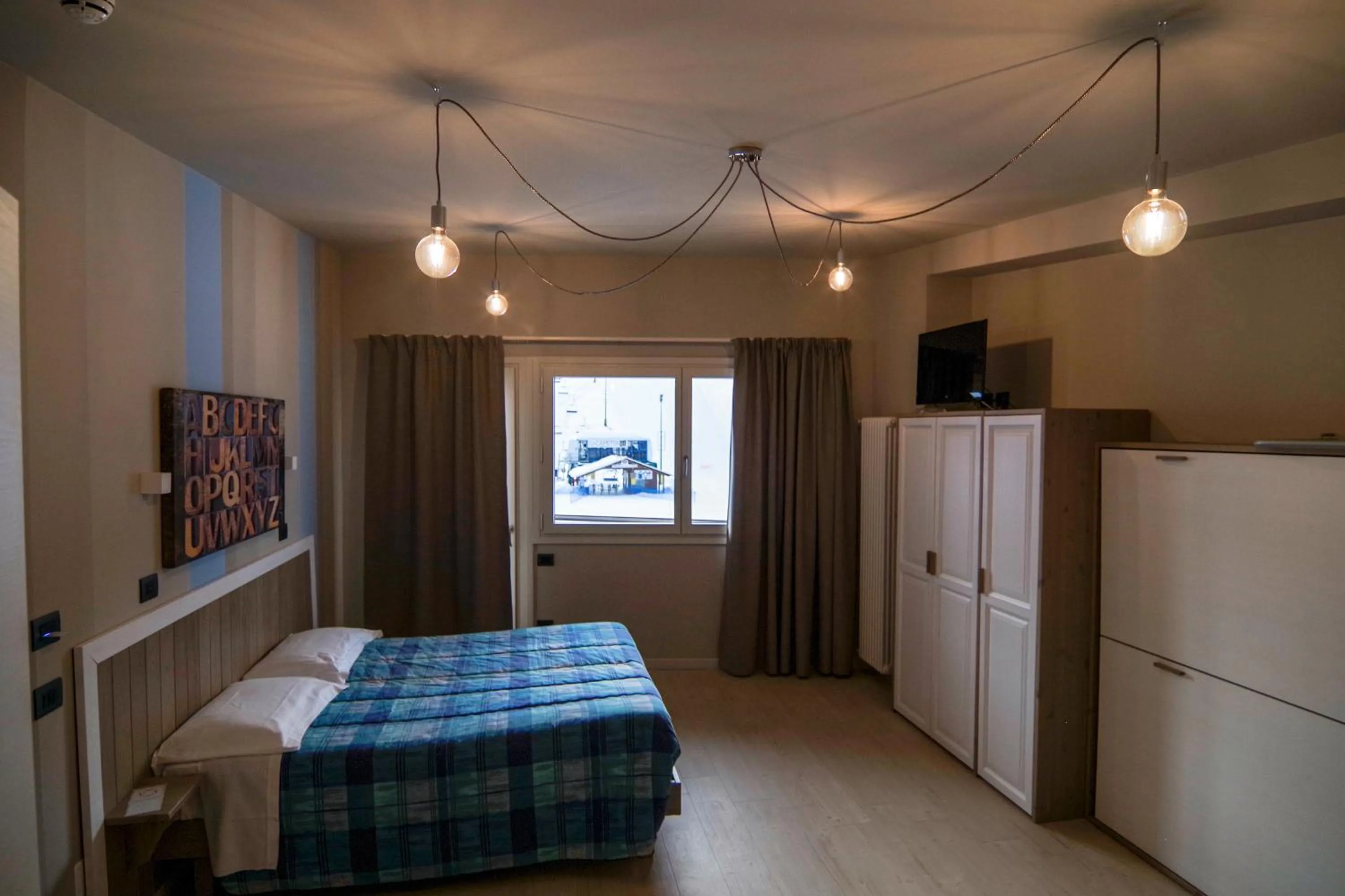 Photo of the whole room, Bed in Hotel Laghetto