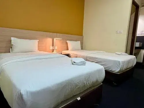 Deluxe Twin Room in OYO 91290 Cozitel Deluxe Twin Room in OYO 91290 Cozitel