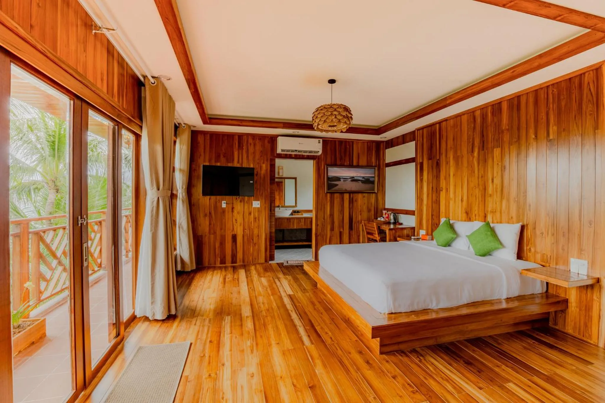 Photo of the whole room, Bed in Rocks Beach Boutique