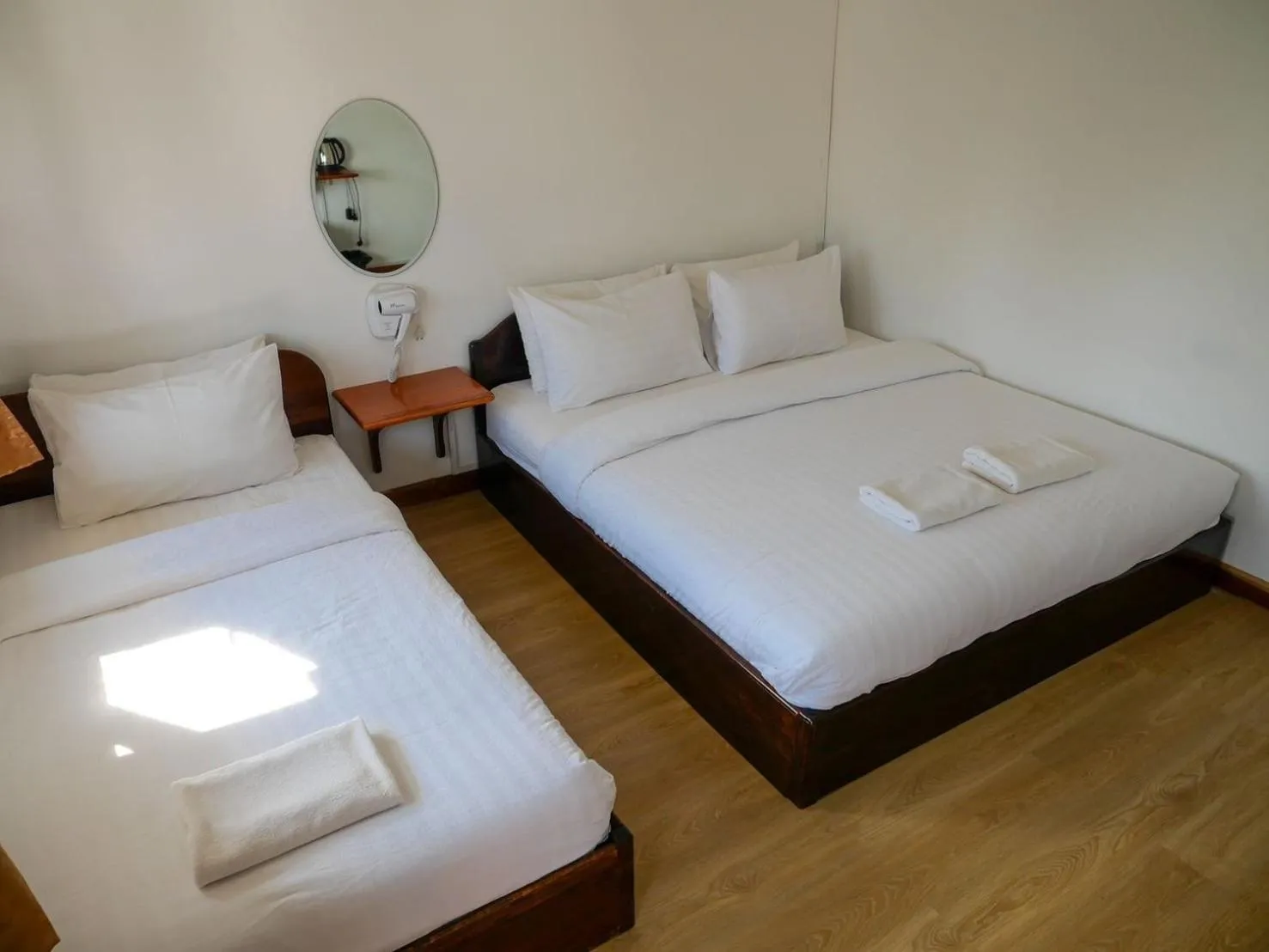 Bed in Riverside Houayxay Hotel