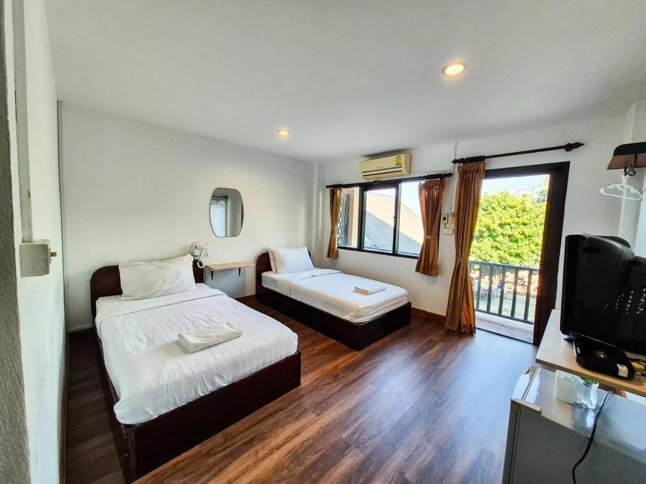 Bed in Riverside Houayxay Hotel