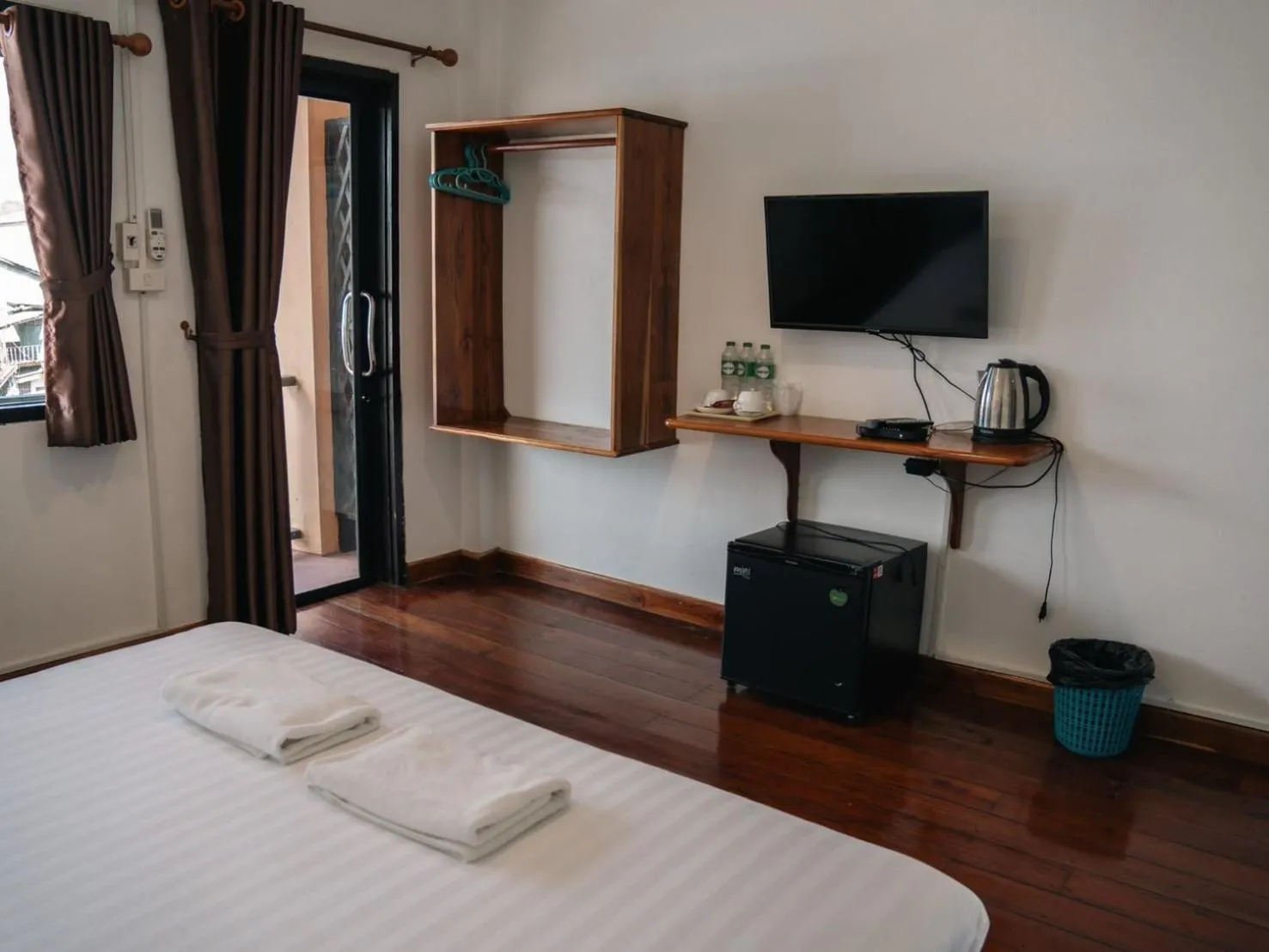 Bed in Riverside Houayxay Hotel