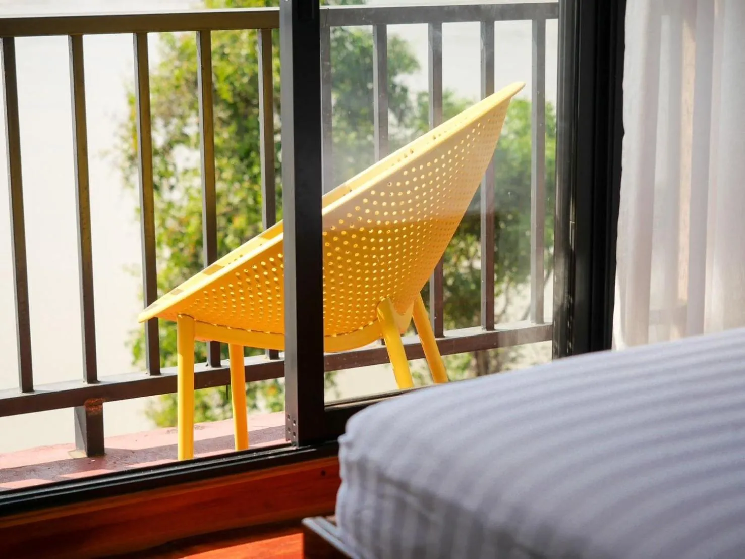 Bed in Riverside Houayxay Hotel