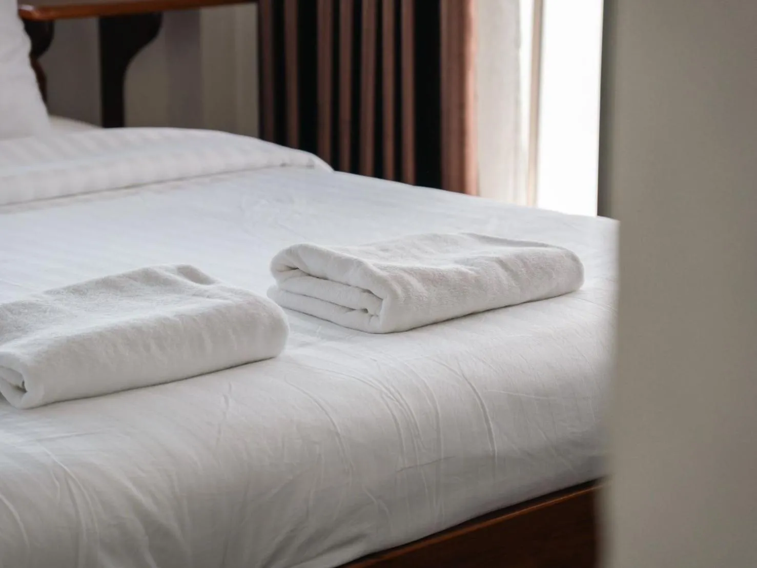 Bed in Riverside Houayxay Hotel