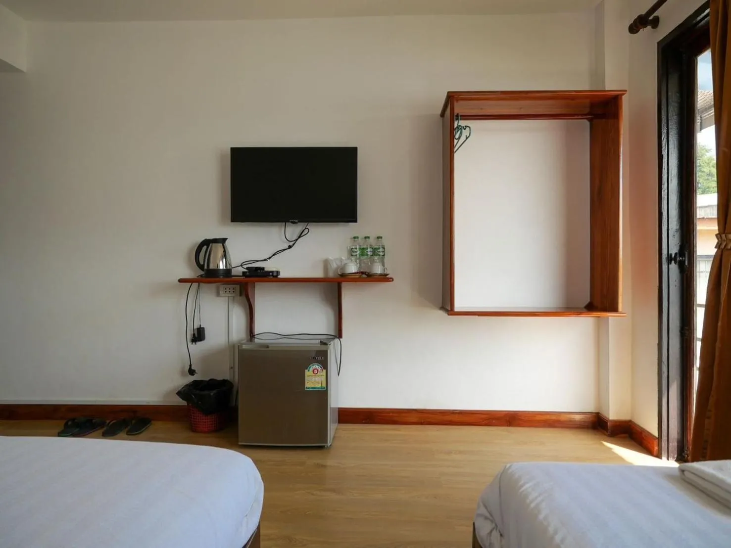 Bed in Riverside Houayxay Hotel
