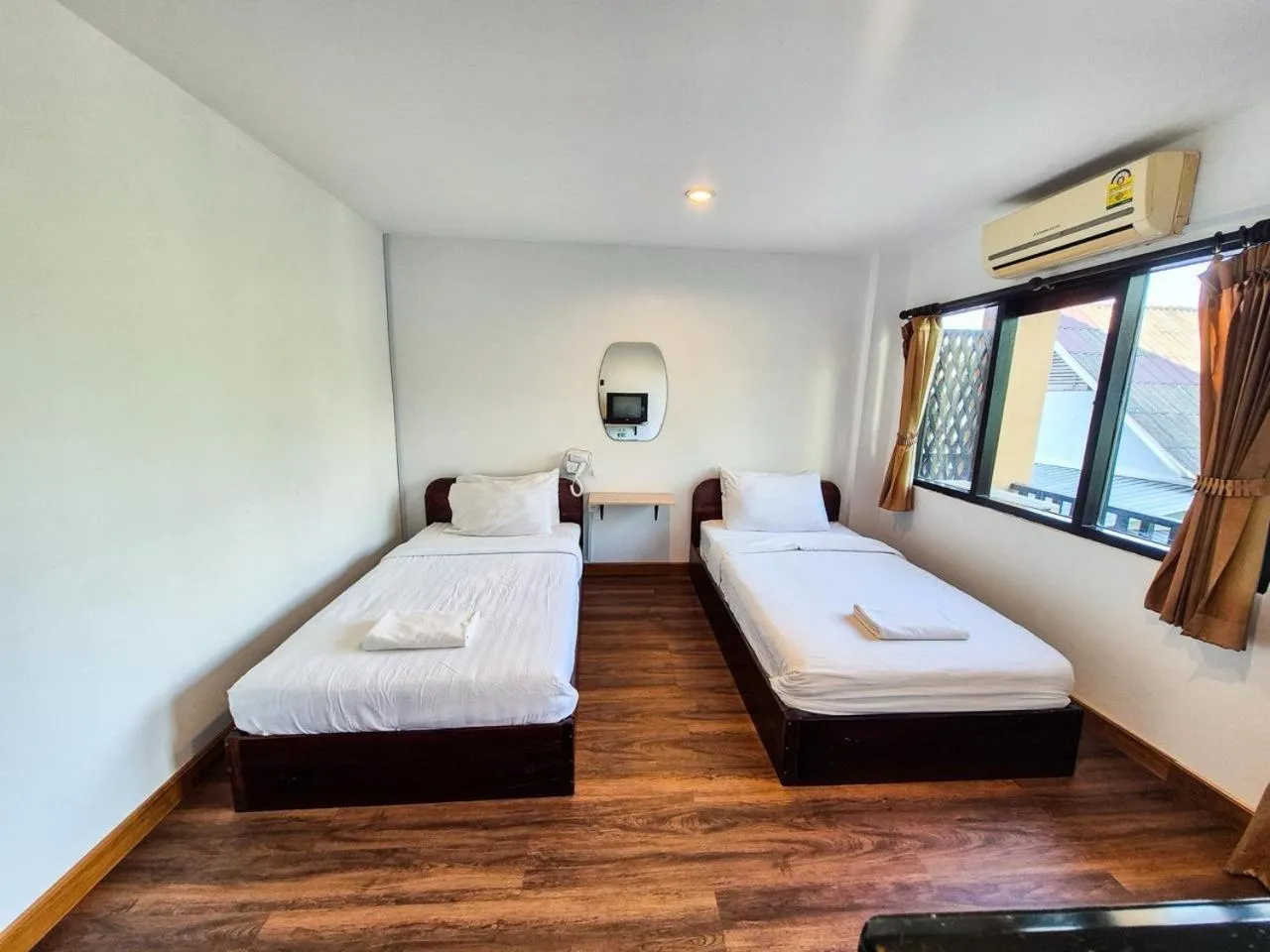 Bed in Riverside Houayxay Hotel