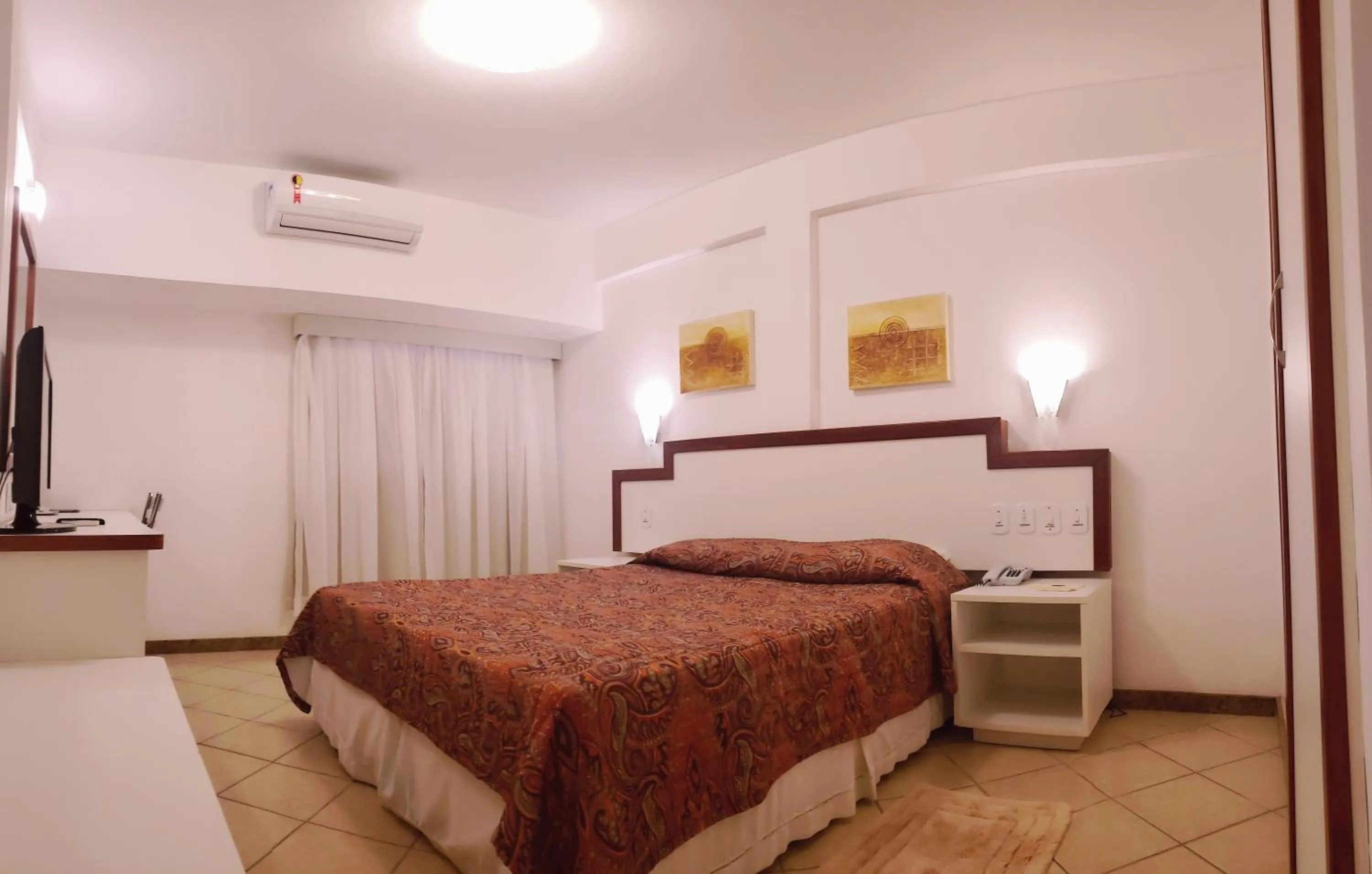 Bed in Lord Plaza Hotel