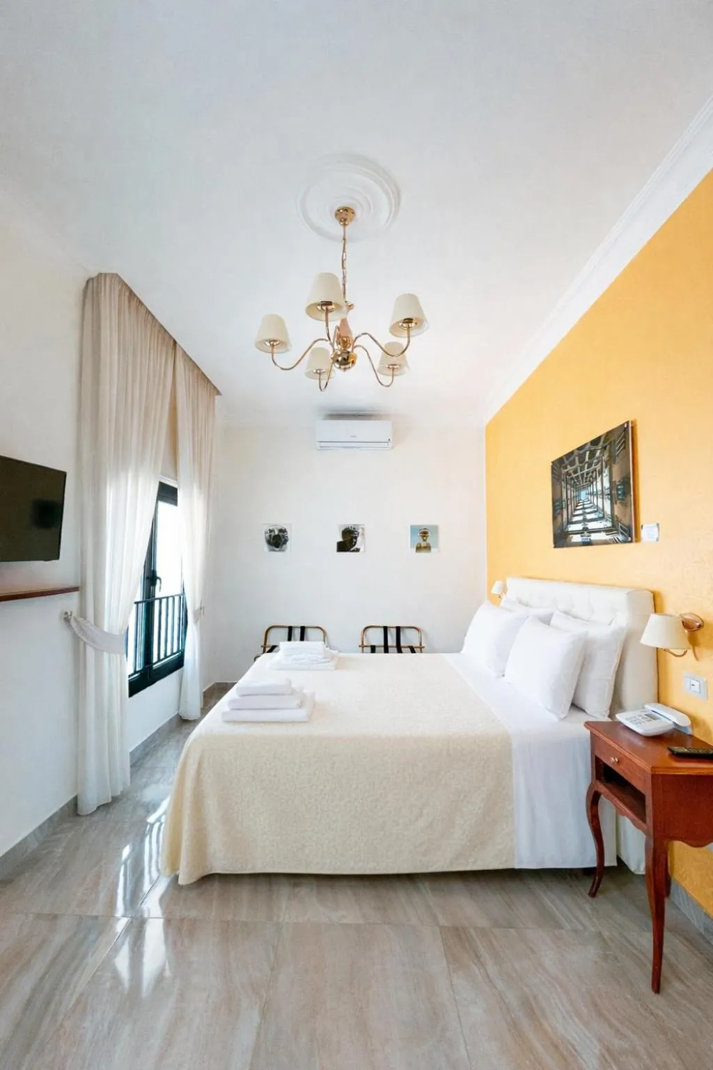 Bed in NeapolitanTrips Hotel