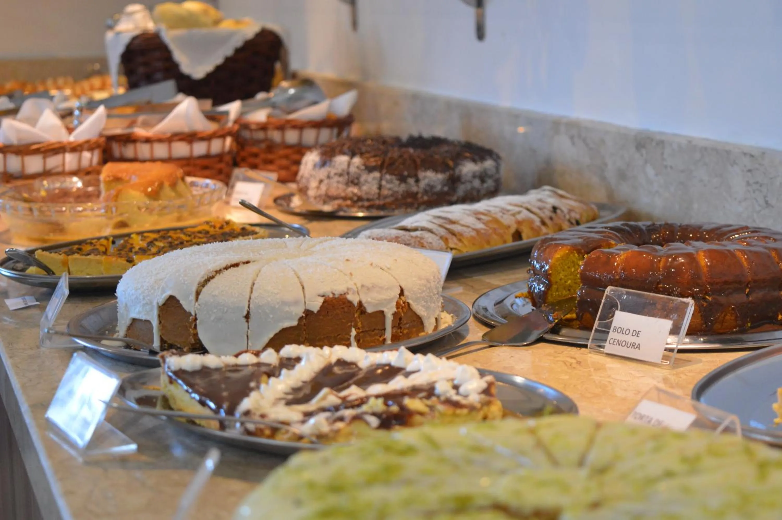 Buffet breakfast in Sky Premium Hotel Gramado - Ótima Localização