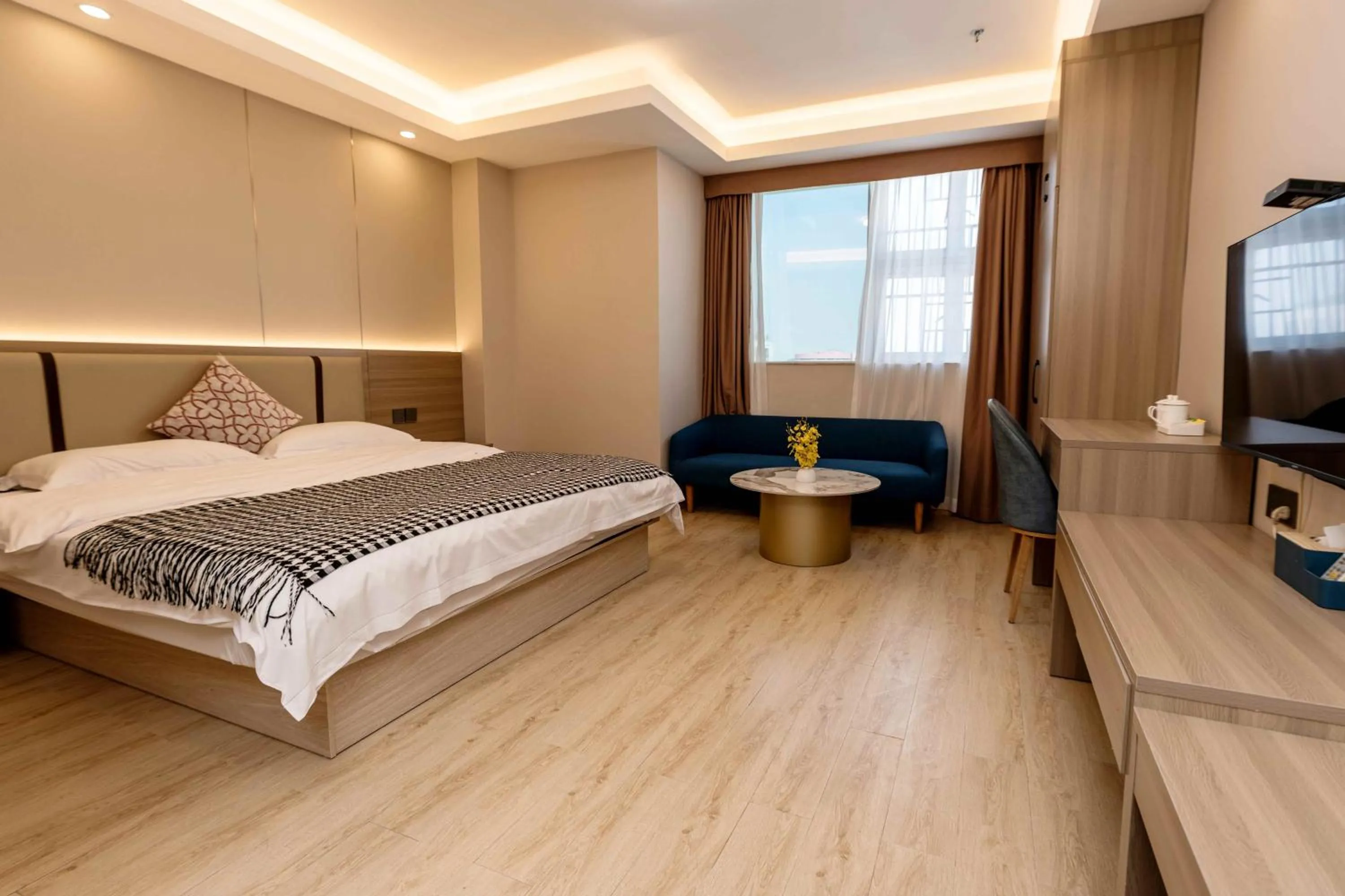 Bed in Guangzhou Xingke Apartment