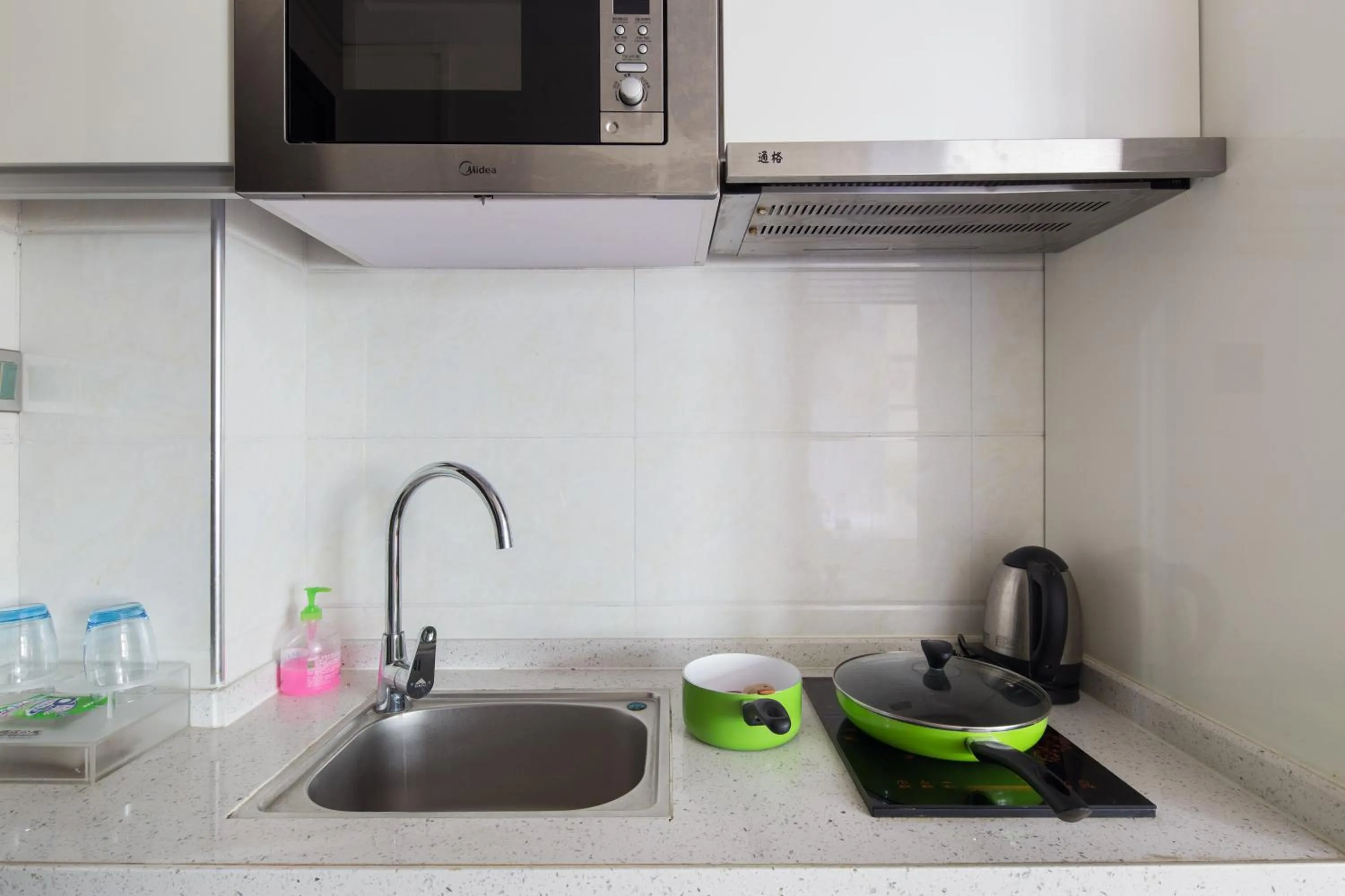 Kitchen or kitchenette in Guangzhou Xingke Apartment